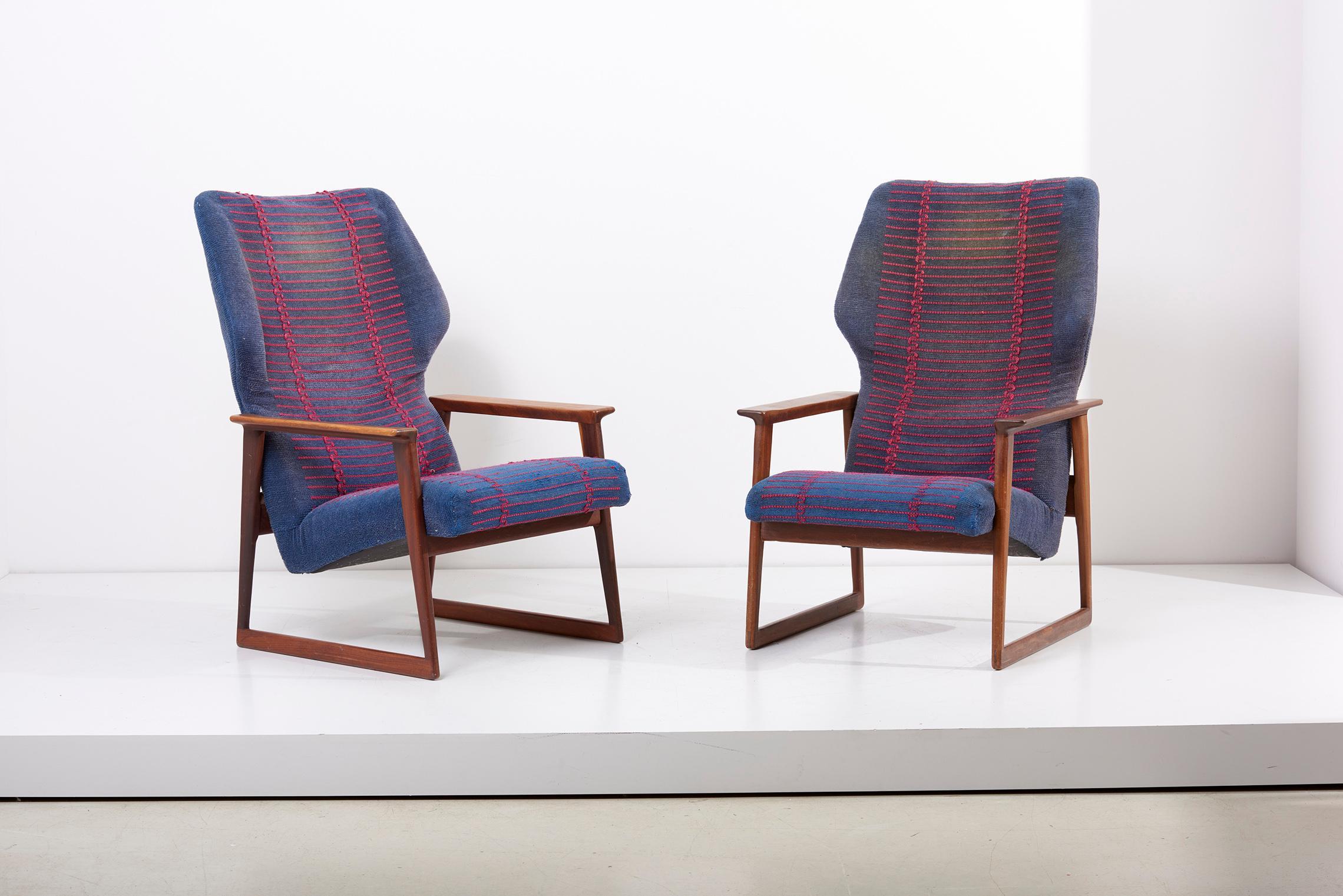 Pair of Danish lounge chairs in teak in original condition.
Unique fabric design in the style of Hans Olsen.