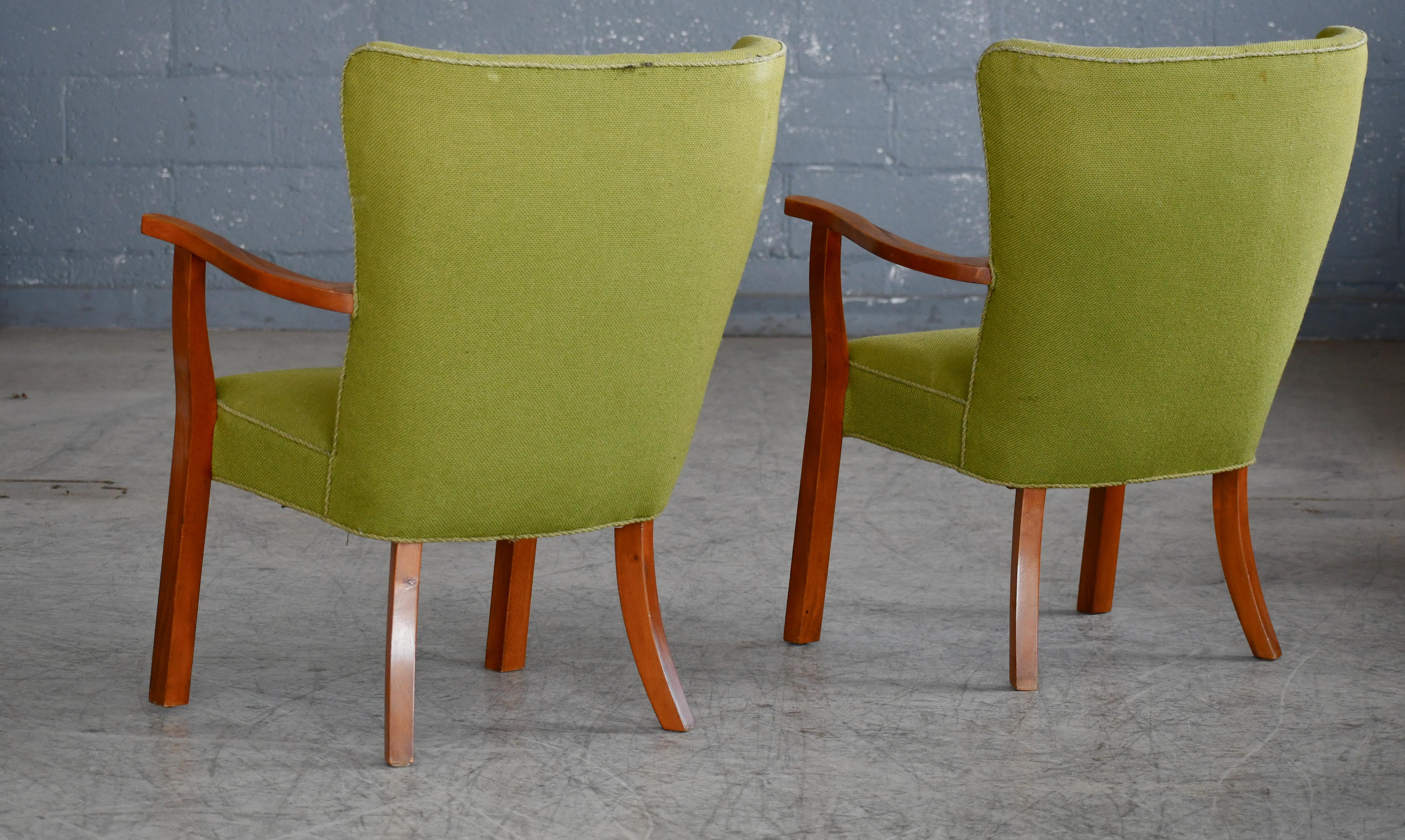 Pair of Danish Lounge or Armchairs with Teak legs and Armrests, 1950's. For Sale 1