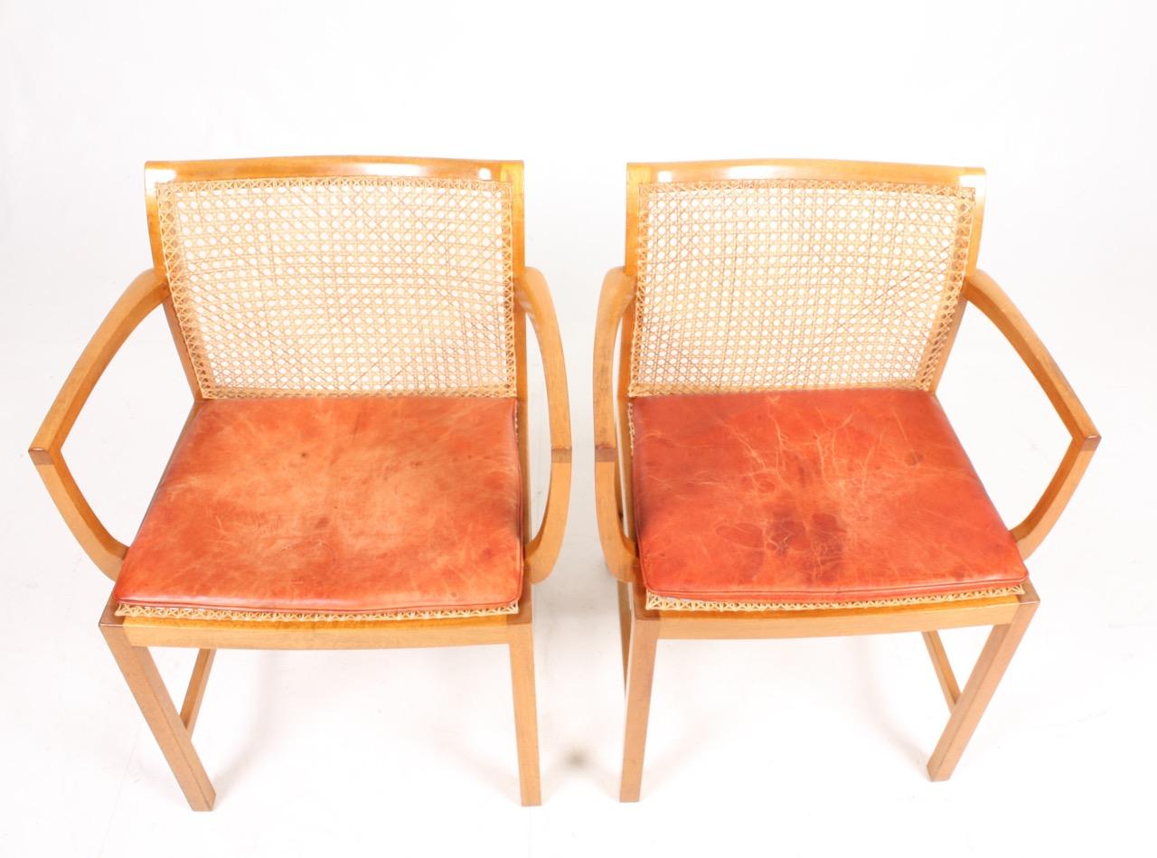 Pair of Danish Midcentury Armchairs in Mahogany and Patinated Leather For Sale 3