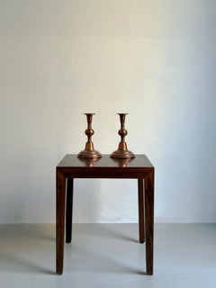 Pair of Danish Mid century candle sticks in genltly hammered patinated copper.