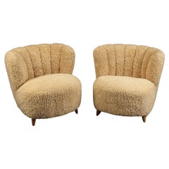 Pair of Danish Mid Century Easy Armchairs in Sheepskin Produced in Denmark 1940s