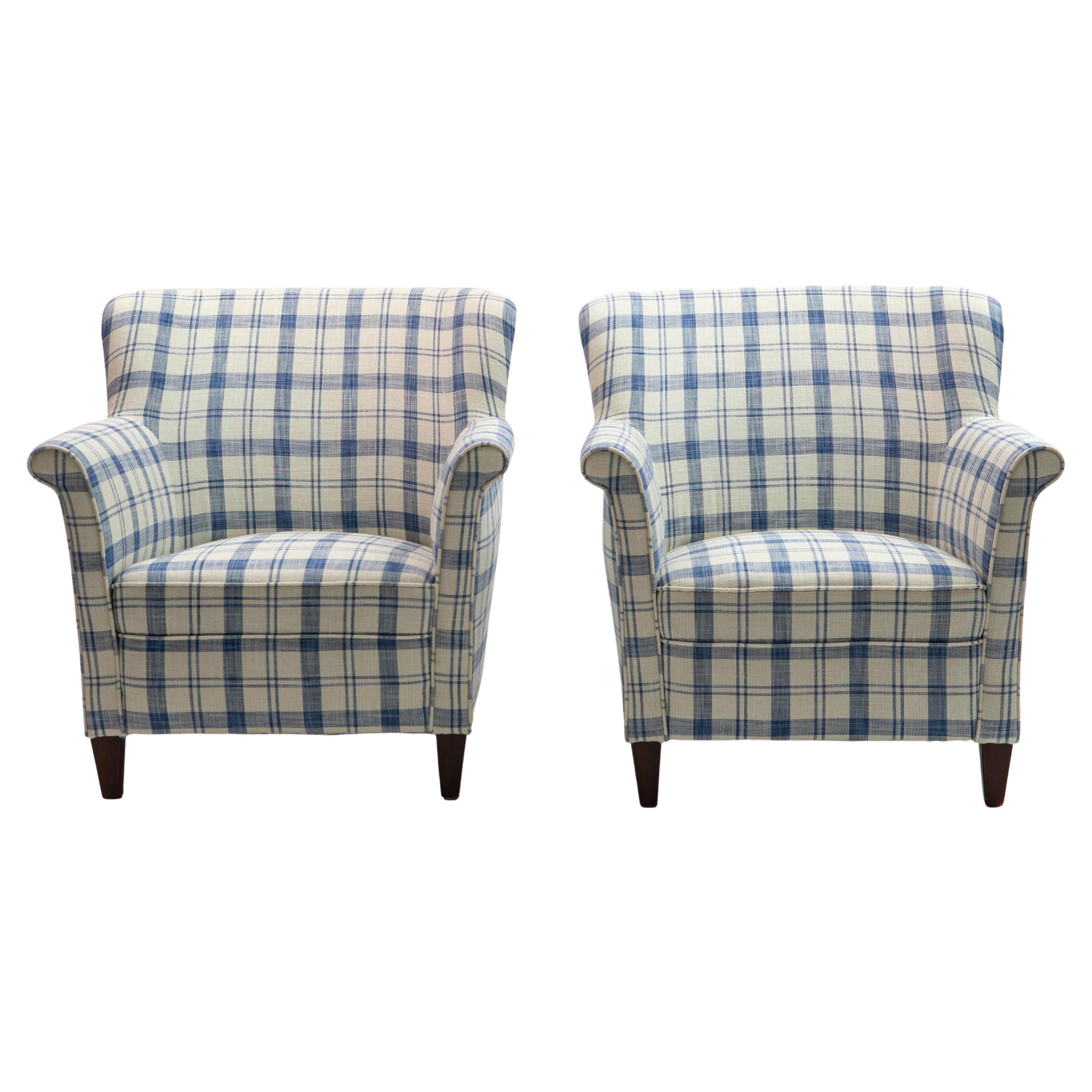 Pair of Danish easy chairs circa 1950.
Newly upholstered in a blue and white check pattern linen blend fabric from 