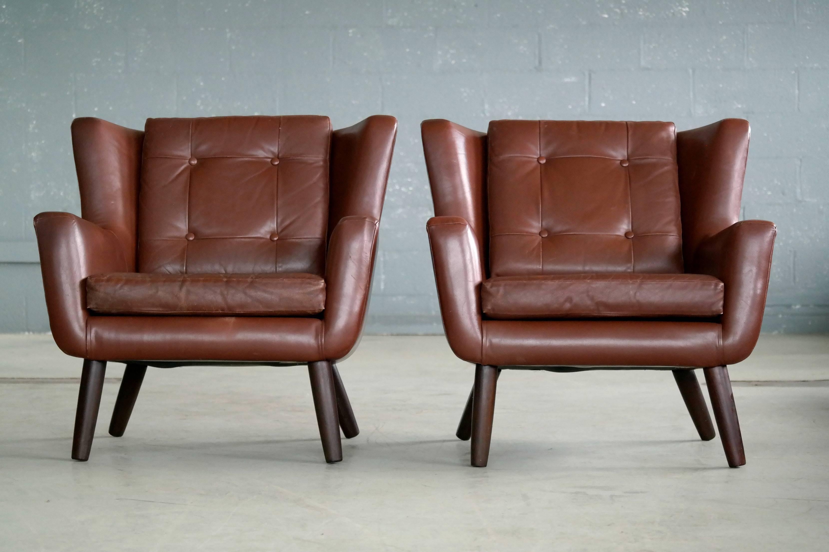 Scandinavian Modern Pair of Danish Mid-Century Easy Chairs in Leather and Teak by Skjold Sørensen