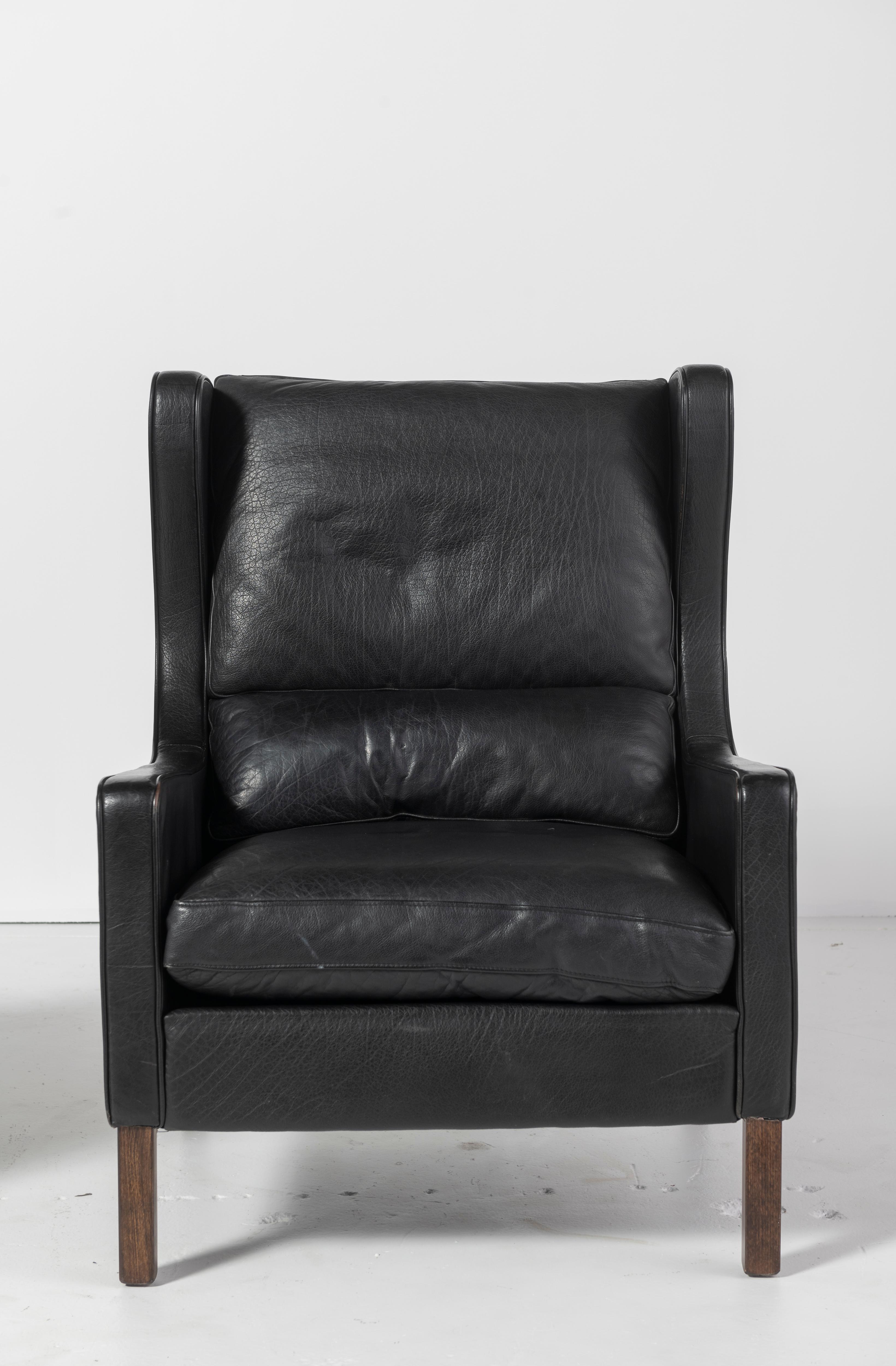 Pair of Danish Mid-Century Modern Black Leather Wingback Chairs In Good Condition In San Francisco, CA