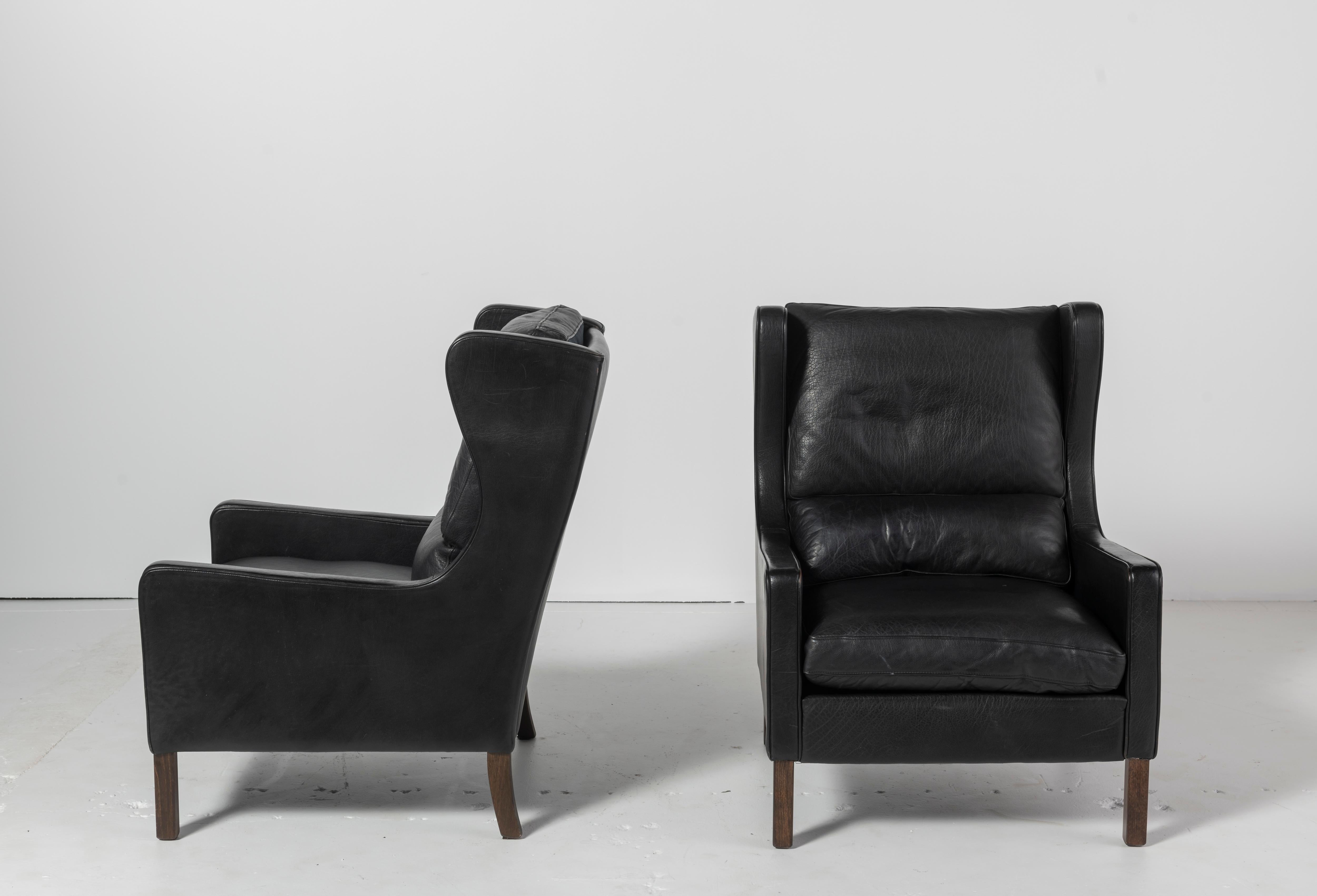 20th Century Pair of Danish Mid-Century Modern Black Leather Wingback Chairs