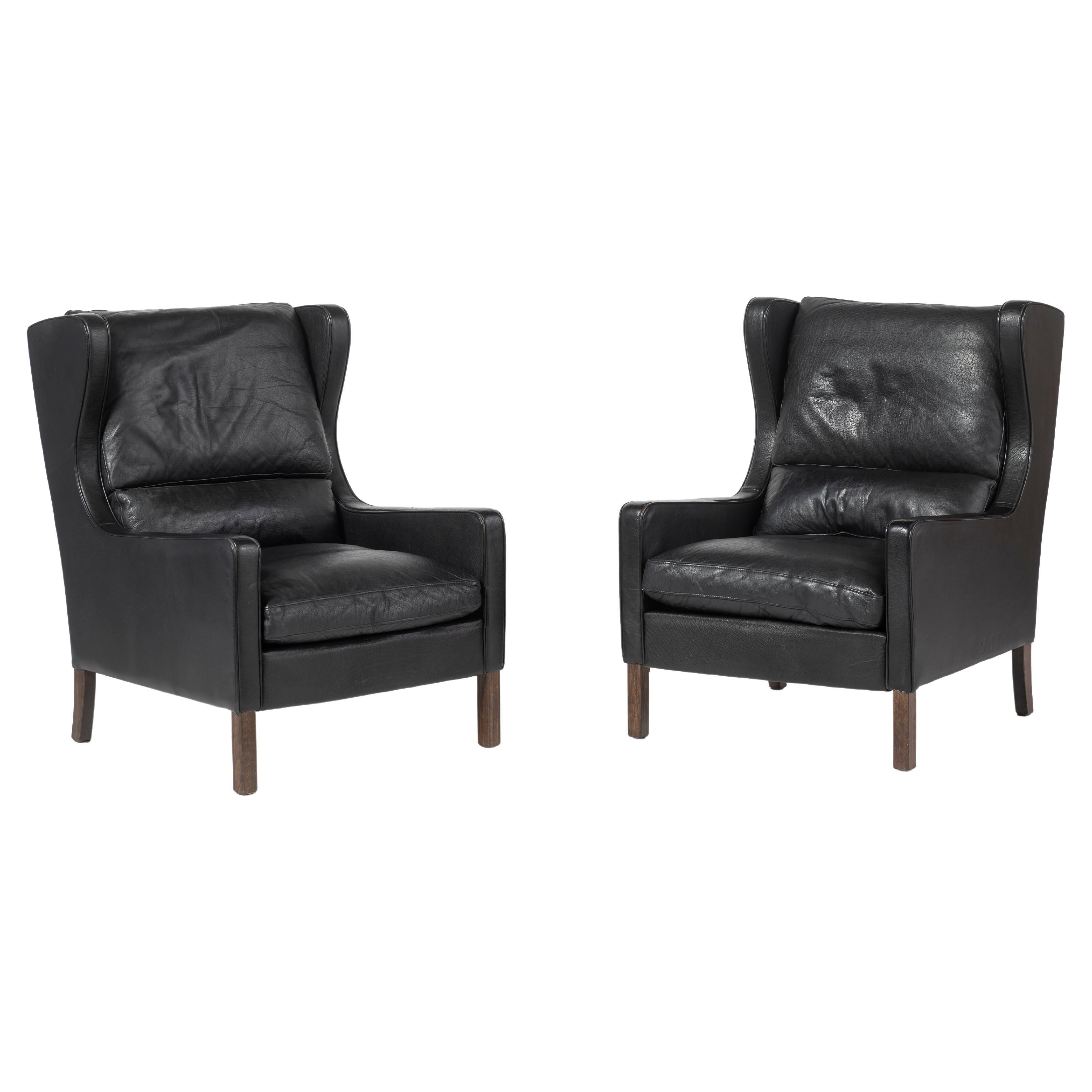 Pair of Danish Mid-Century Modern Black Leather Wingback Chairs