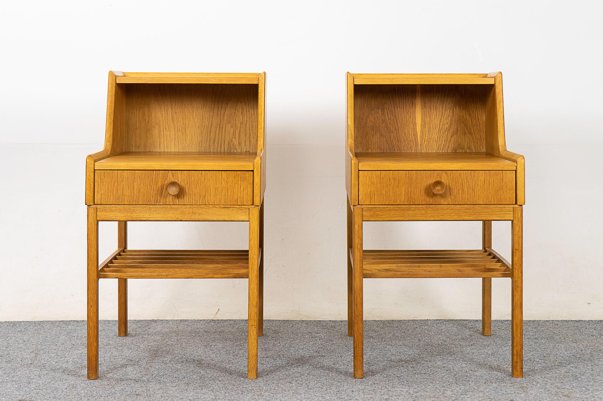Set of 2 Oak bedside tables, circa 1960's. Dovetailed drawer for small items, lower shelf is perfect for your favorite book!