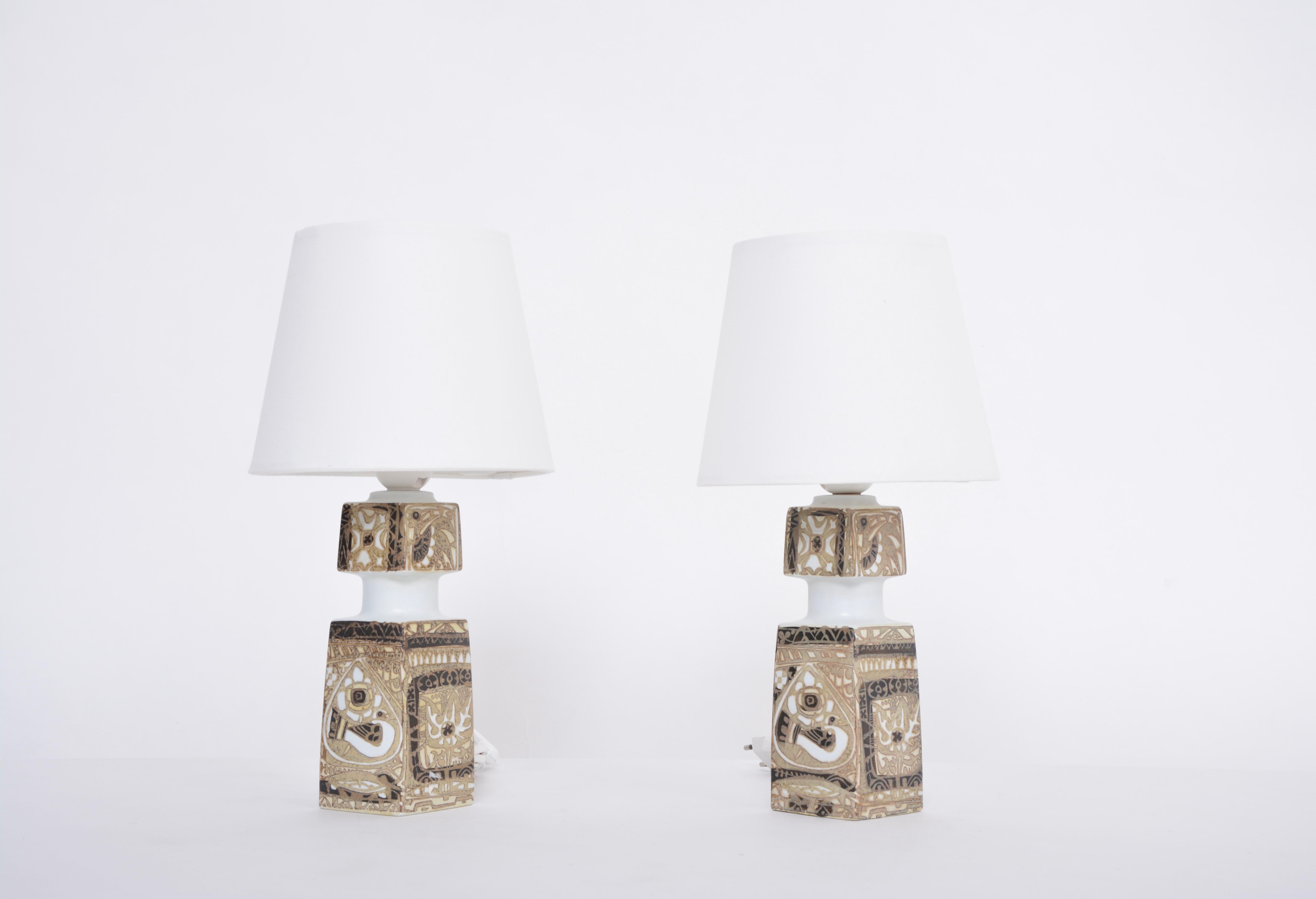 Pair of Danish Mid-Century Modern table lamps by Nils Thorsson for Fog & Morup

These table lamps were designed by Royal Copenhagen's head designer for the BACA series, Nils Thorsson in the 1960s. The lamps were produced by Danish company Fog &