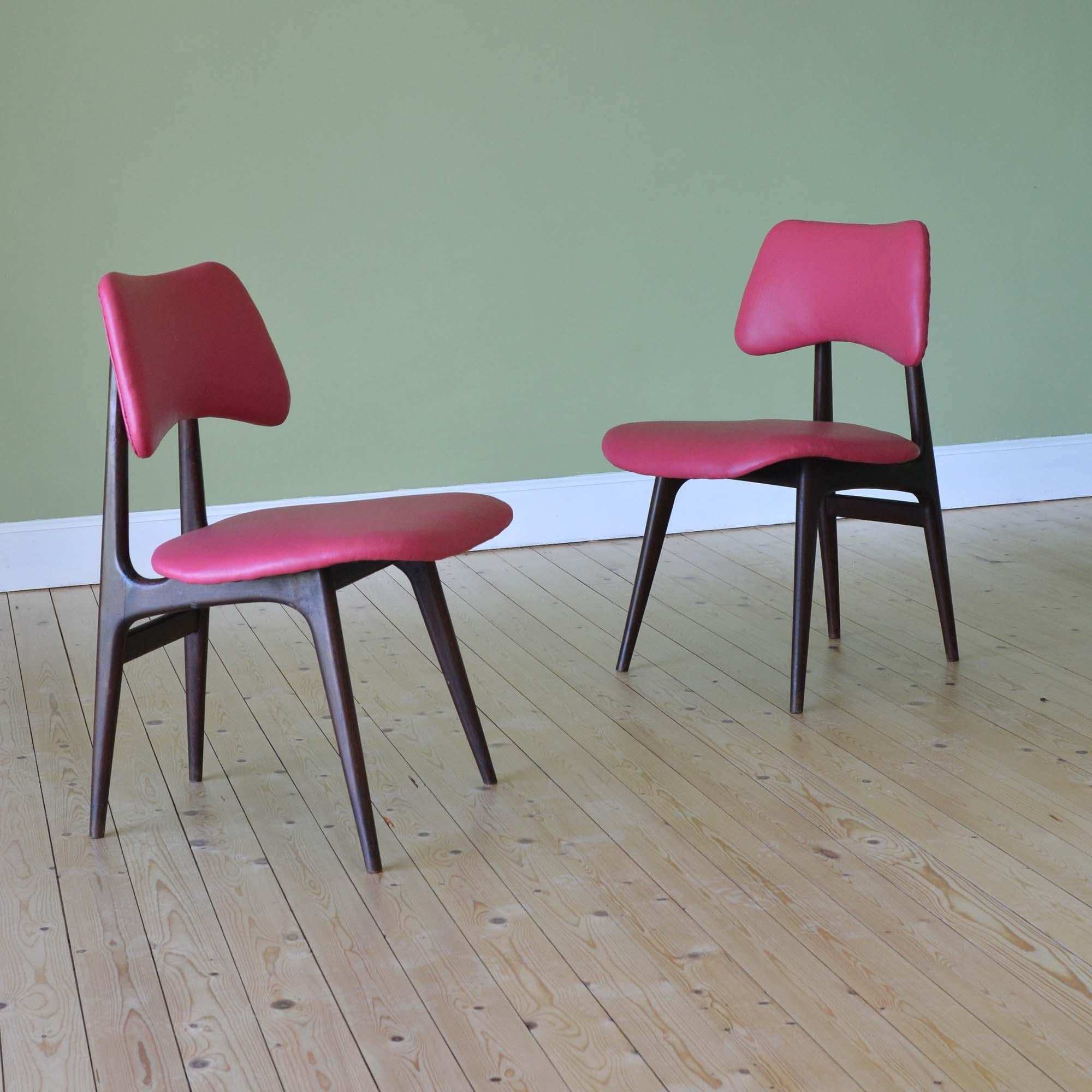 Pair of Danish Mid-Century Walnut Chairs
Likely to by Arne Hovmand-Olsen this pair of chairs were retailed by Heals & Co. and are from the collection of an executive of the company in the 60's.   Shapely walnut frames, newly upholstered in pink