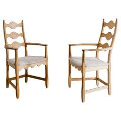 Paire de fauteuils danois en chêne du milieu du siècle par Henry Kjaernulf, années 1950