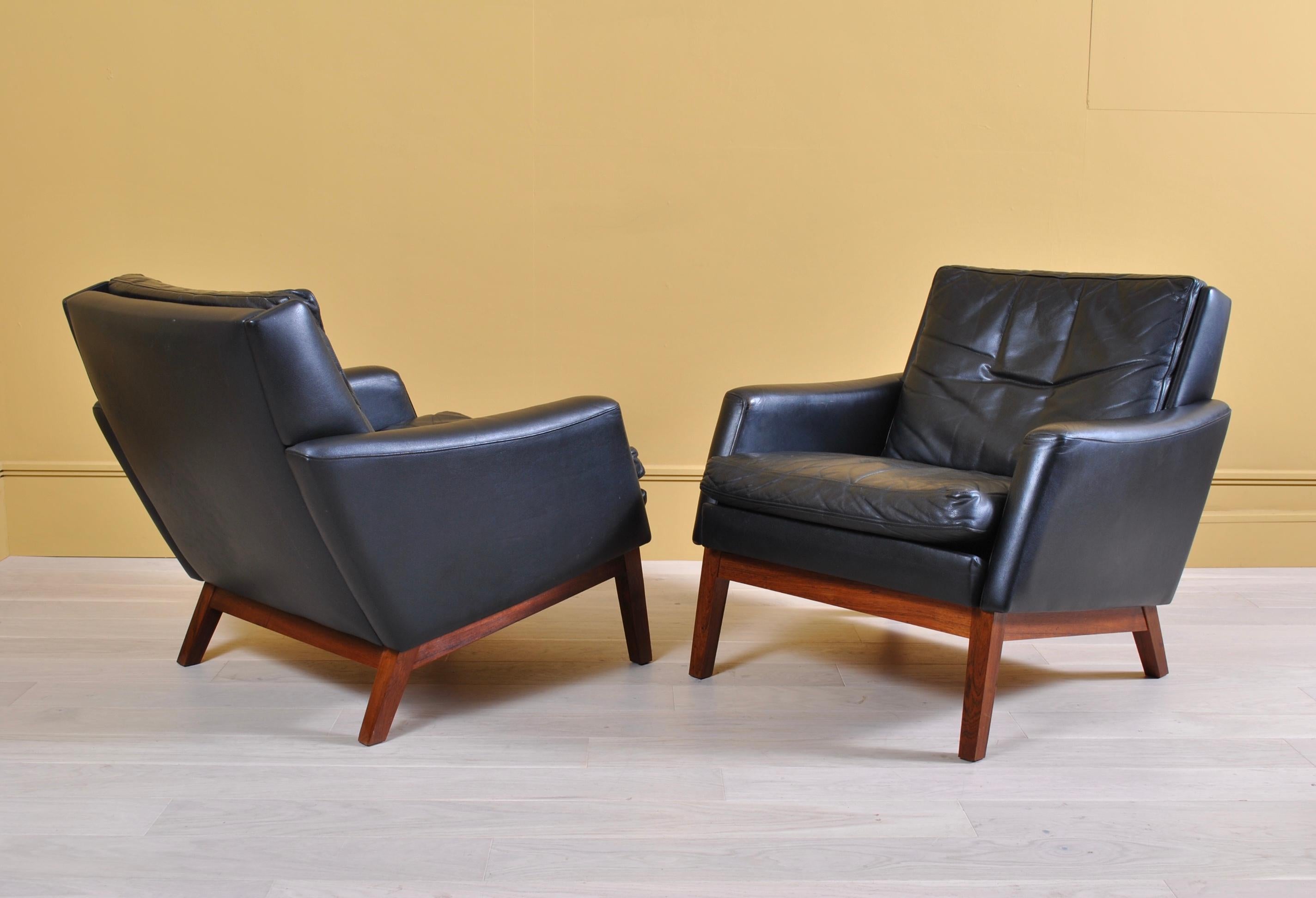 20th Century Pair of Danish Midcentury Leather Lounge Chairs and Ottoman