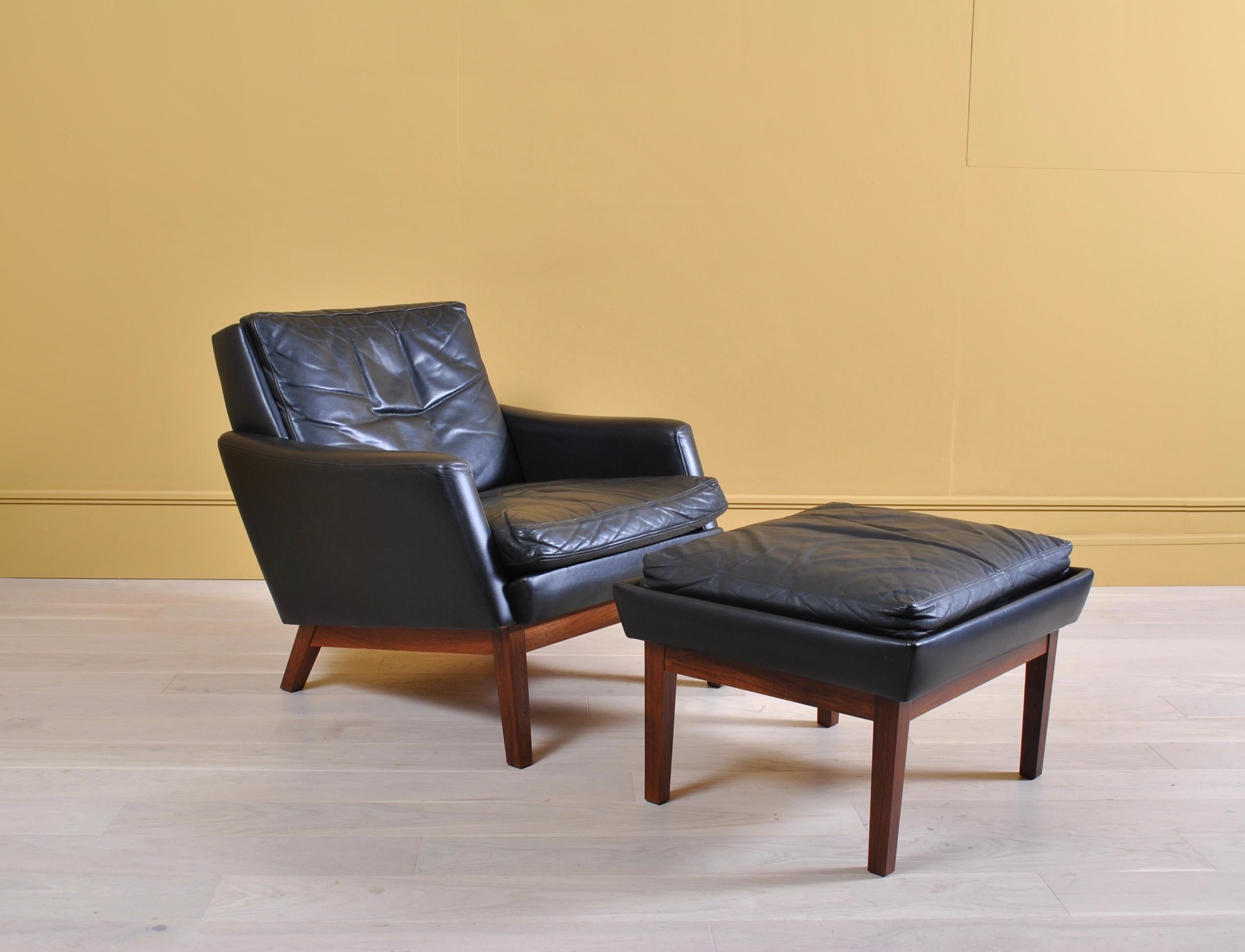 Pair of Danish Midcentury Leather Lounge Chairs and Ottoman 1