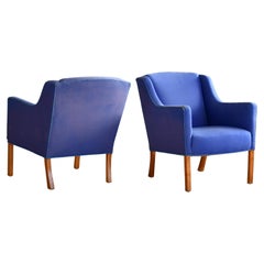 Paire de fauteuils de salon danois du milieu du siècle, attribués à Ejnar Larsen et Axel Bender