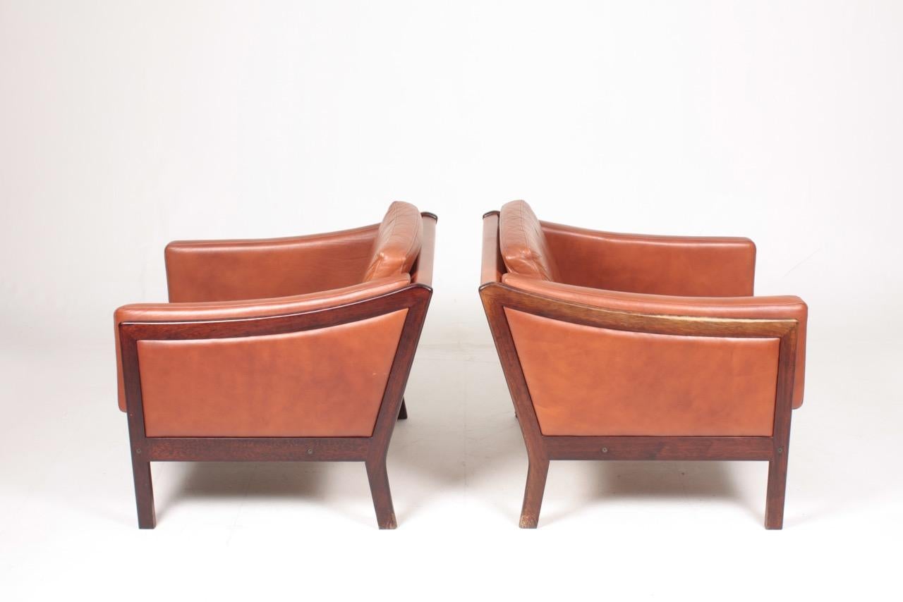 Mid-20th Century Pair of Danish Midcentury Lounge Chairs in Patinated Leather, 1960s