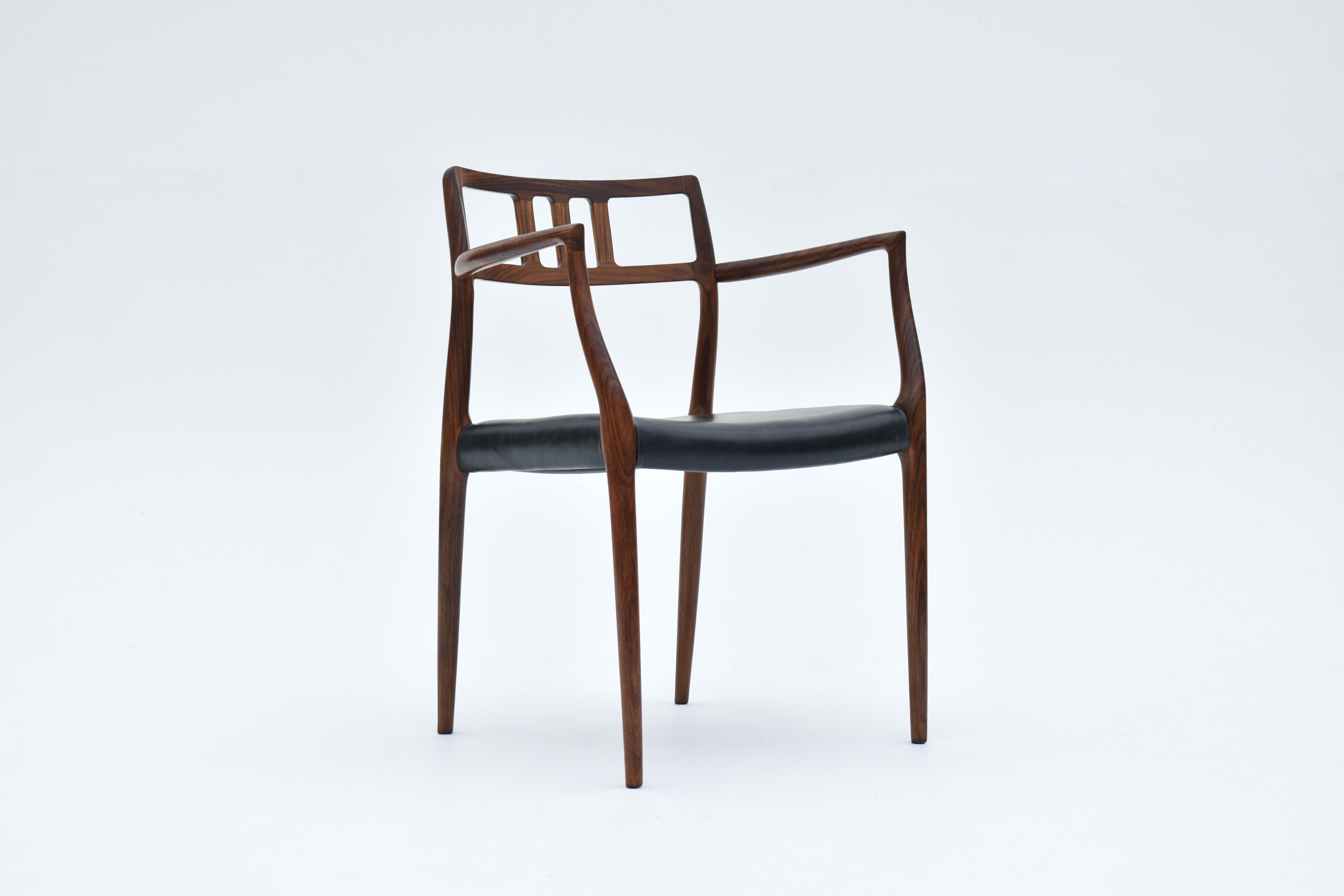 Paire de fauteuils danois du milieu du siècle en palissandre modèle 64 de Niels Møller, 1966 en vente 4