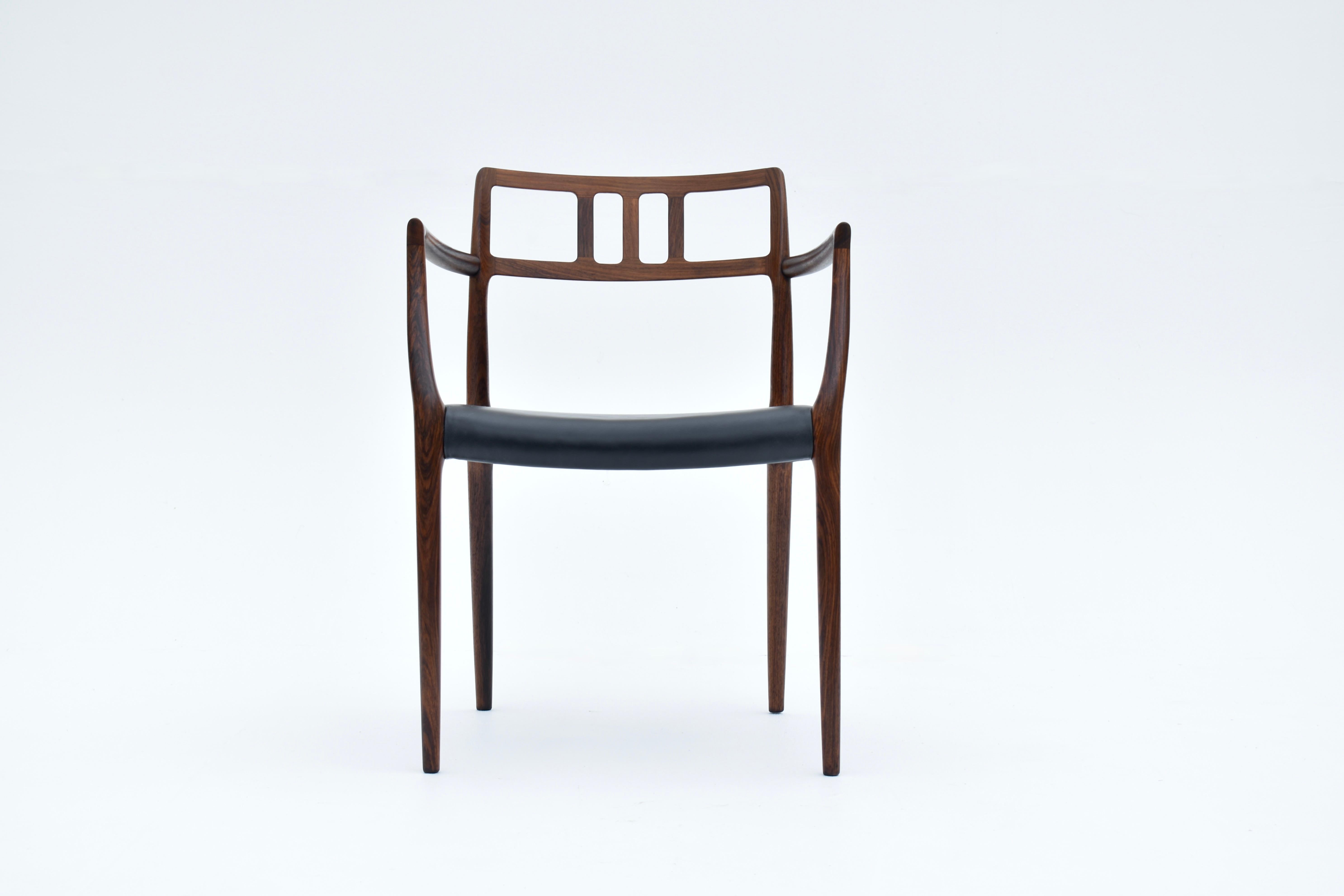 Paire de fauteuils danois du milieu du siècle en palissandre modèle 64 de Niels Møller, 1966 en vente 7