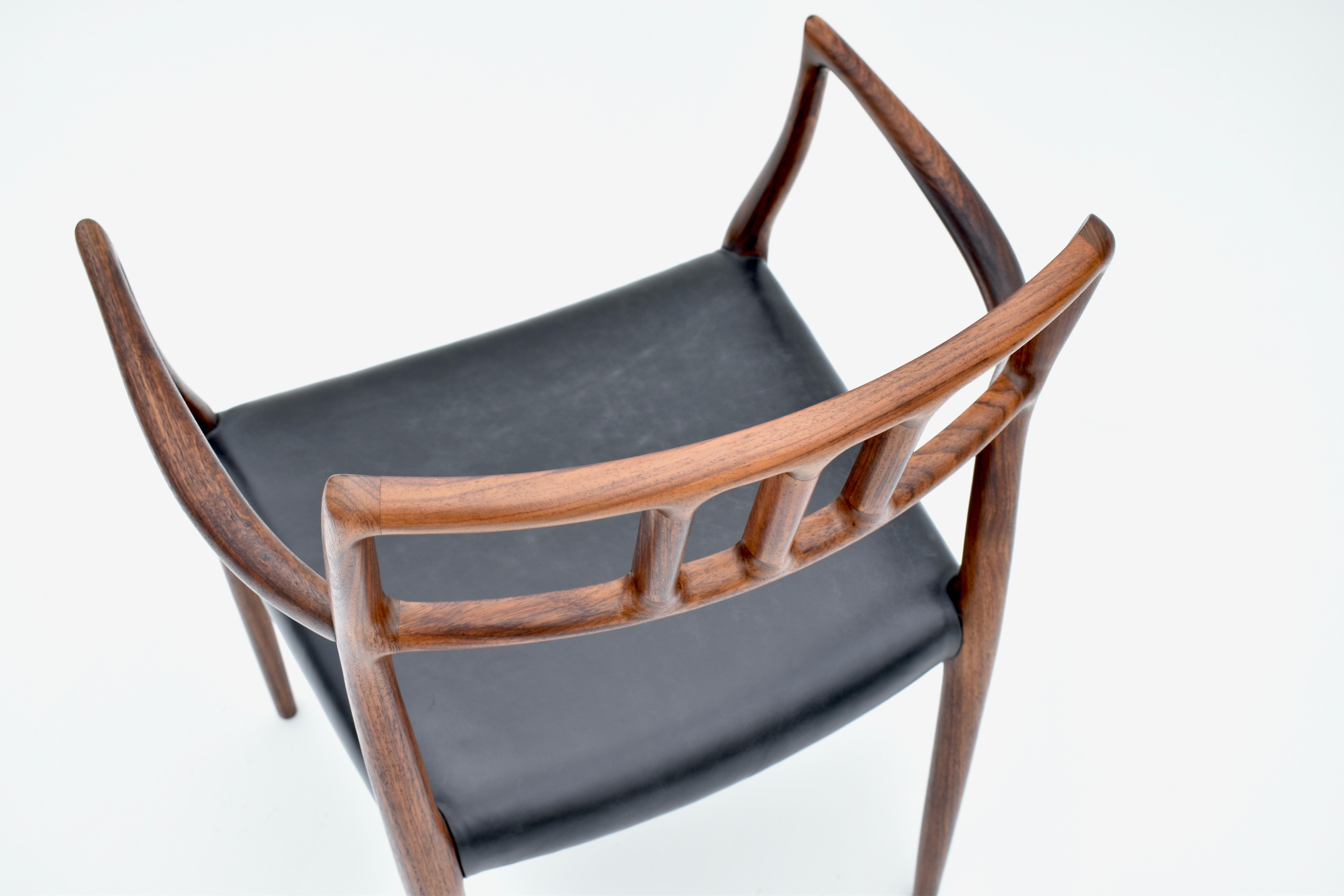 Paire de fauteuils danois du milieu du siècle en palissandre modèle 64 de Niels Møller, 1966 en vente 10