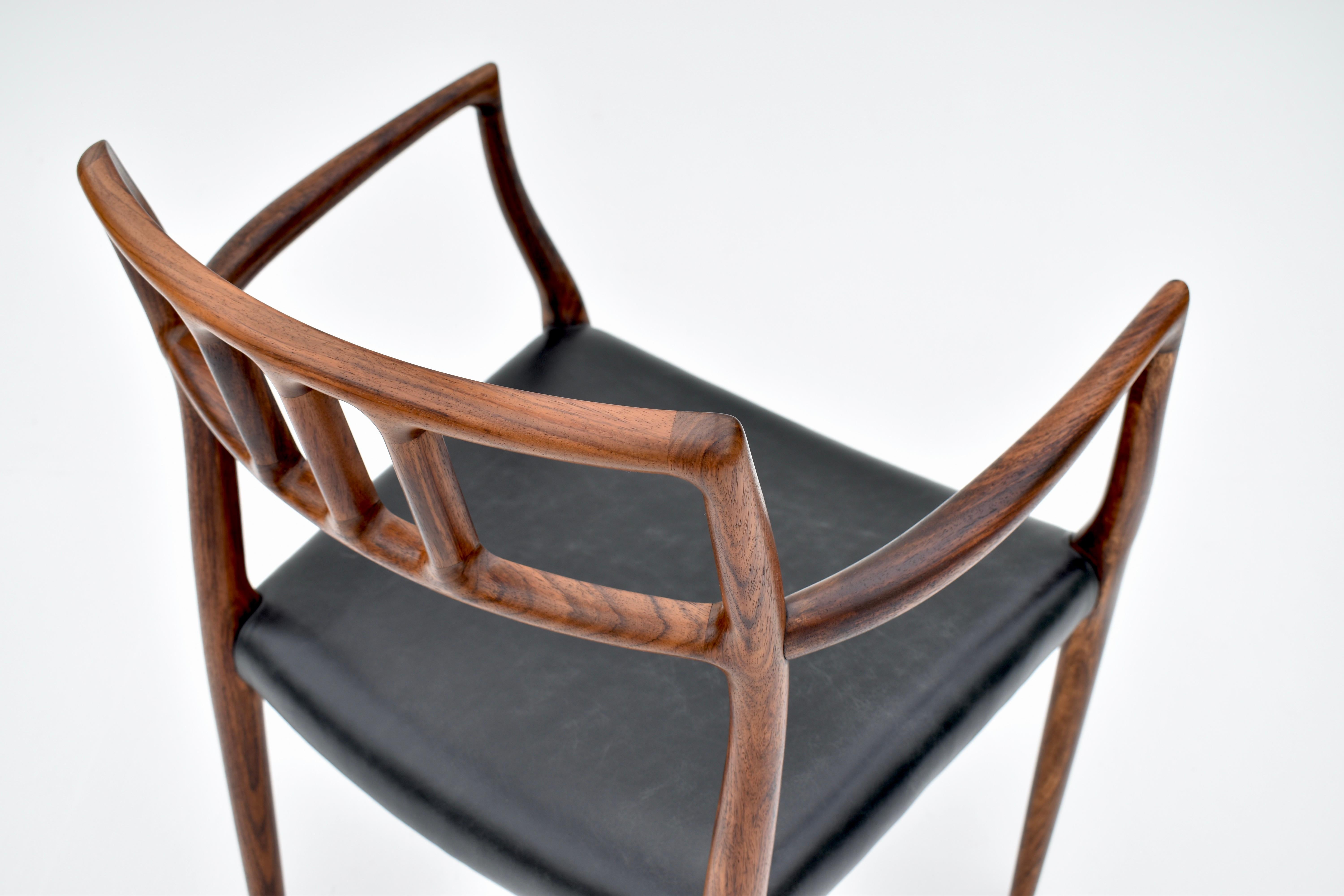 Paire de fauteuils danois du milieu du siècle en palissandre modèle 64 de Niels Møller, 1966 en vente 12