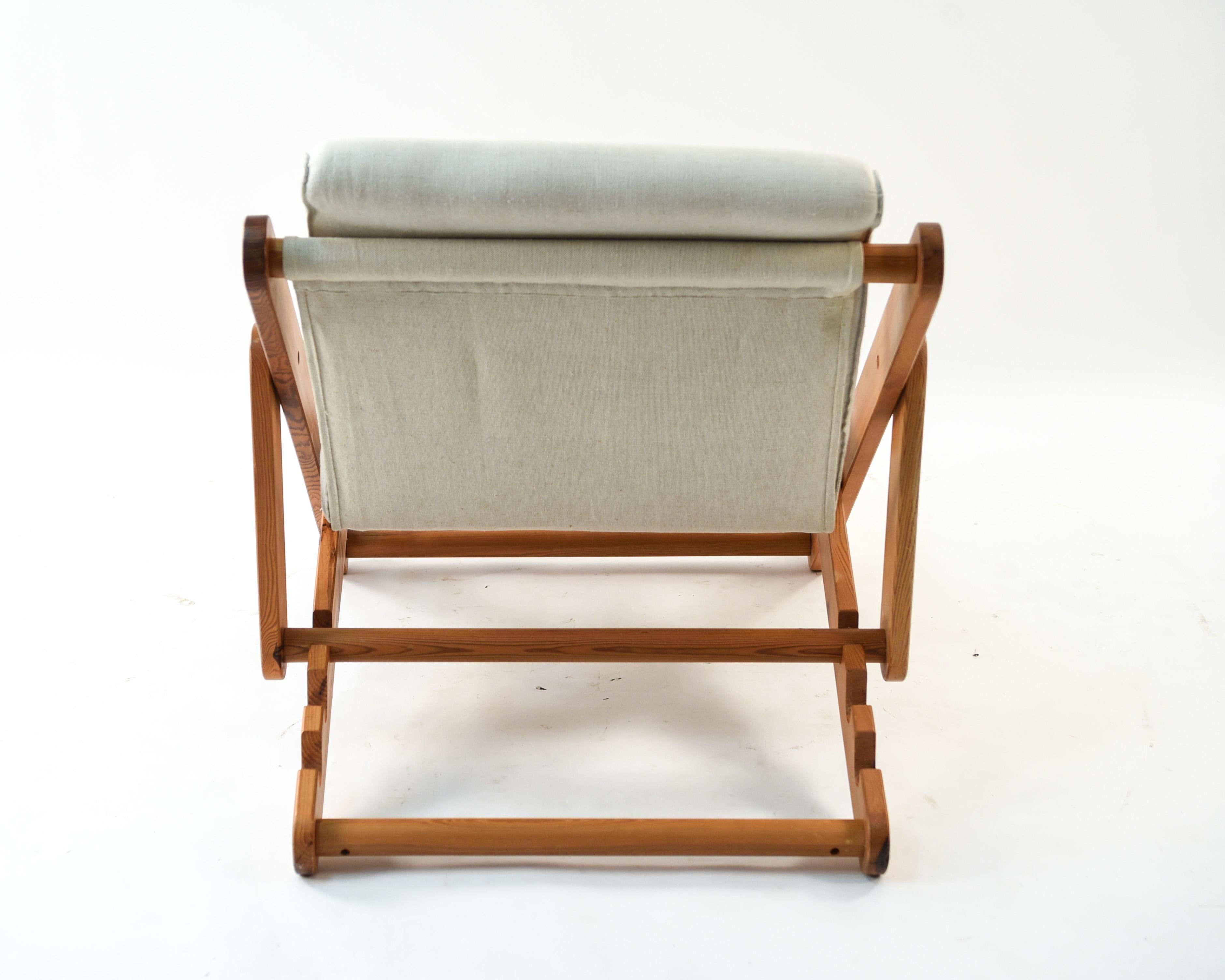 Paire de chaises longues danoises Kontiki en pin du milieu du siècle dernier par Gillis Lundgren 8