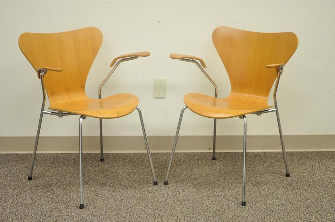 Authentic pair of Danish modern Fritz Hansen Arne Jacobsen series 7 armchairs for knoll studio. Item features manufacturer labels found on the underside of each chair. Current retail is approximate $1,247 per chair, circa 1999, Denmark.