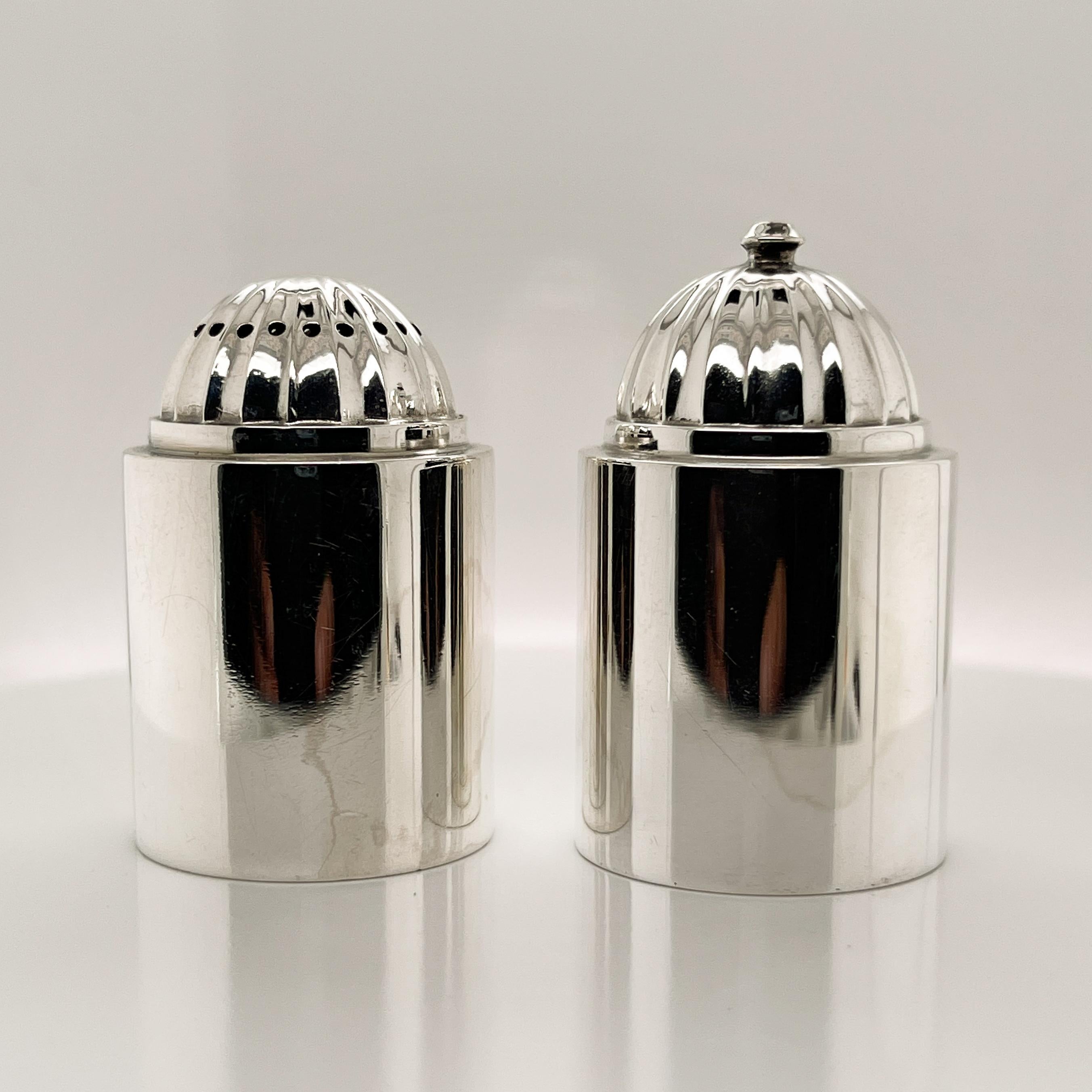 A pair of Georg Jensen sterling silver salt and pepper shakers.

Model No. 627. 

Designed by Ove Brobeck. 

A rare and fine pair!

Date:
20th Century

Overall Condition:
They are in overall, good, as-pictured, used estate condition with some very