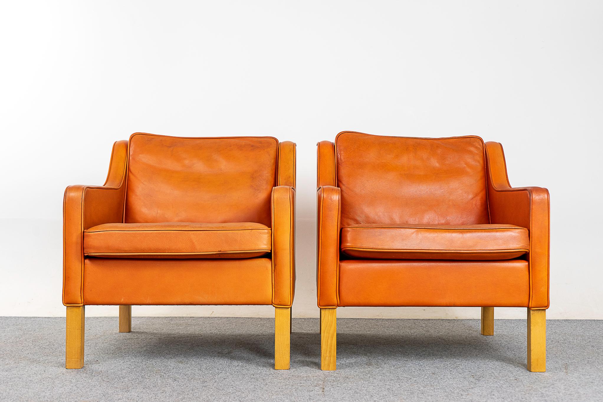Leather and beech wood Danish lounge chair pair, circa 1960's. Original tobacco brown leather with lovely patina.

Please inquire for remote and international shipping rates.