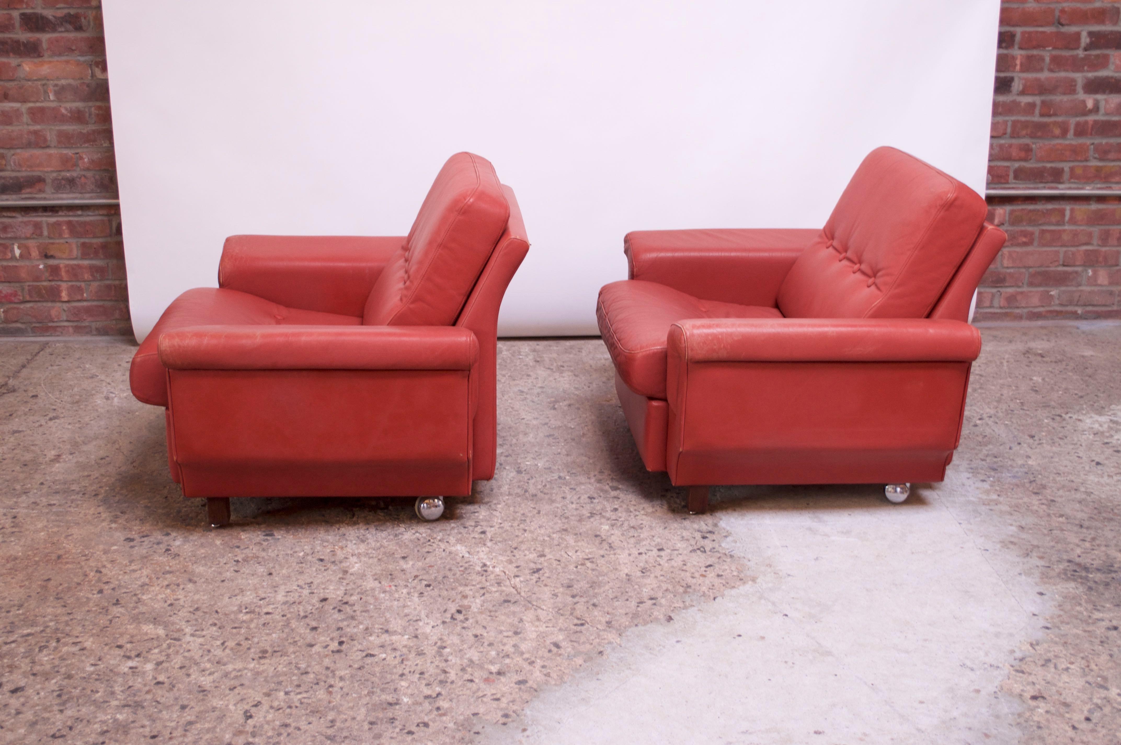 Stained Pair of Danish Modern Lounge Chairs in Cinnabar Leather