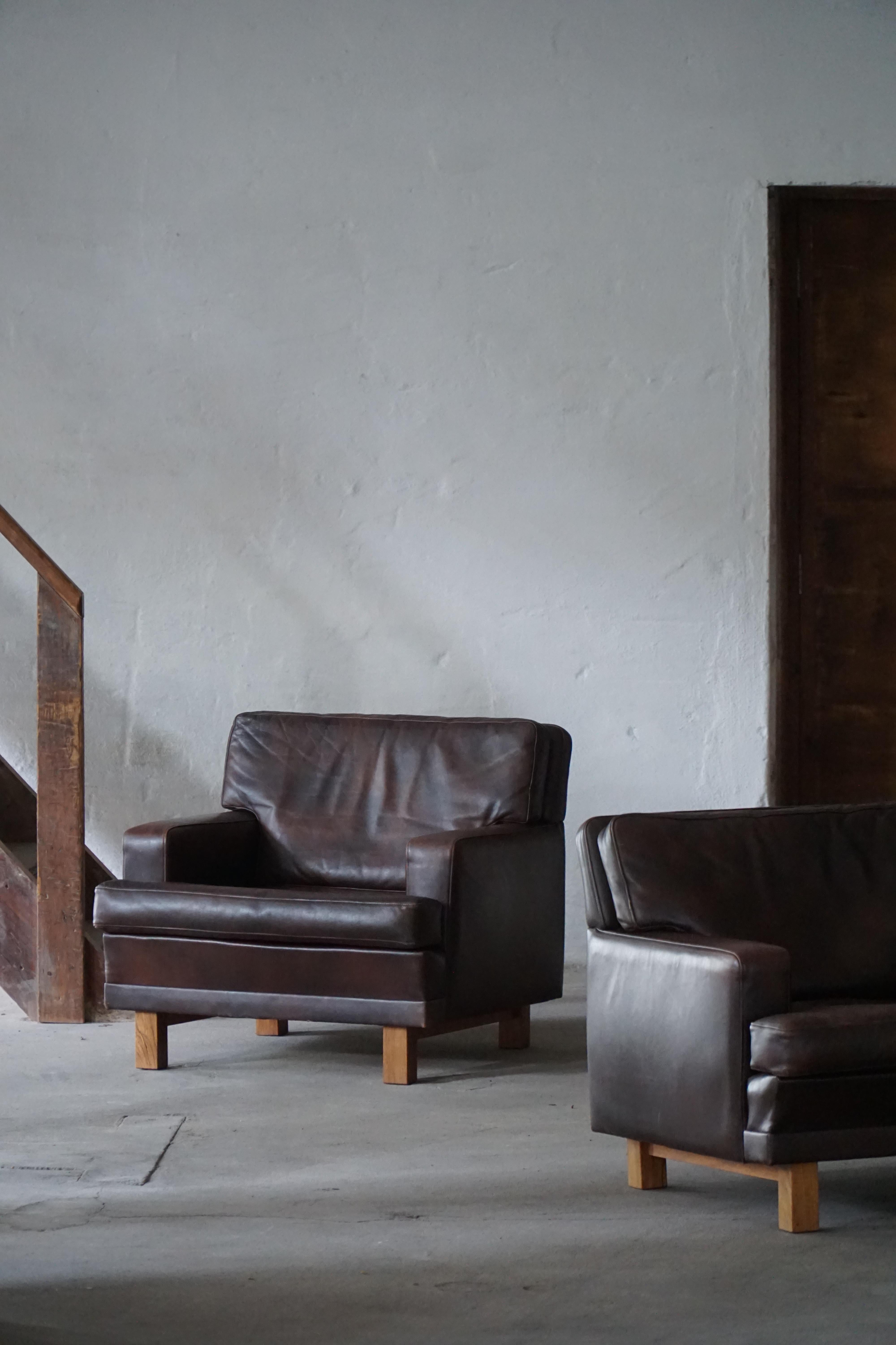 Pair of Danish Modern Lounge Chairs in Dark Brown Leather & Rosewood, 1960s In Good Condition For Sale In Odense, DK
