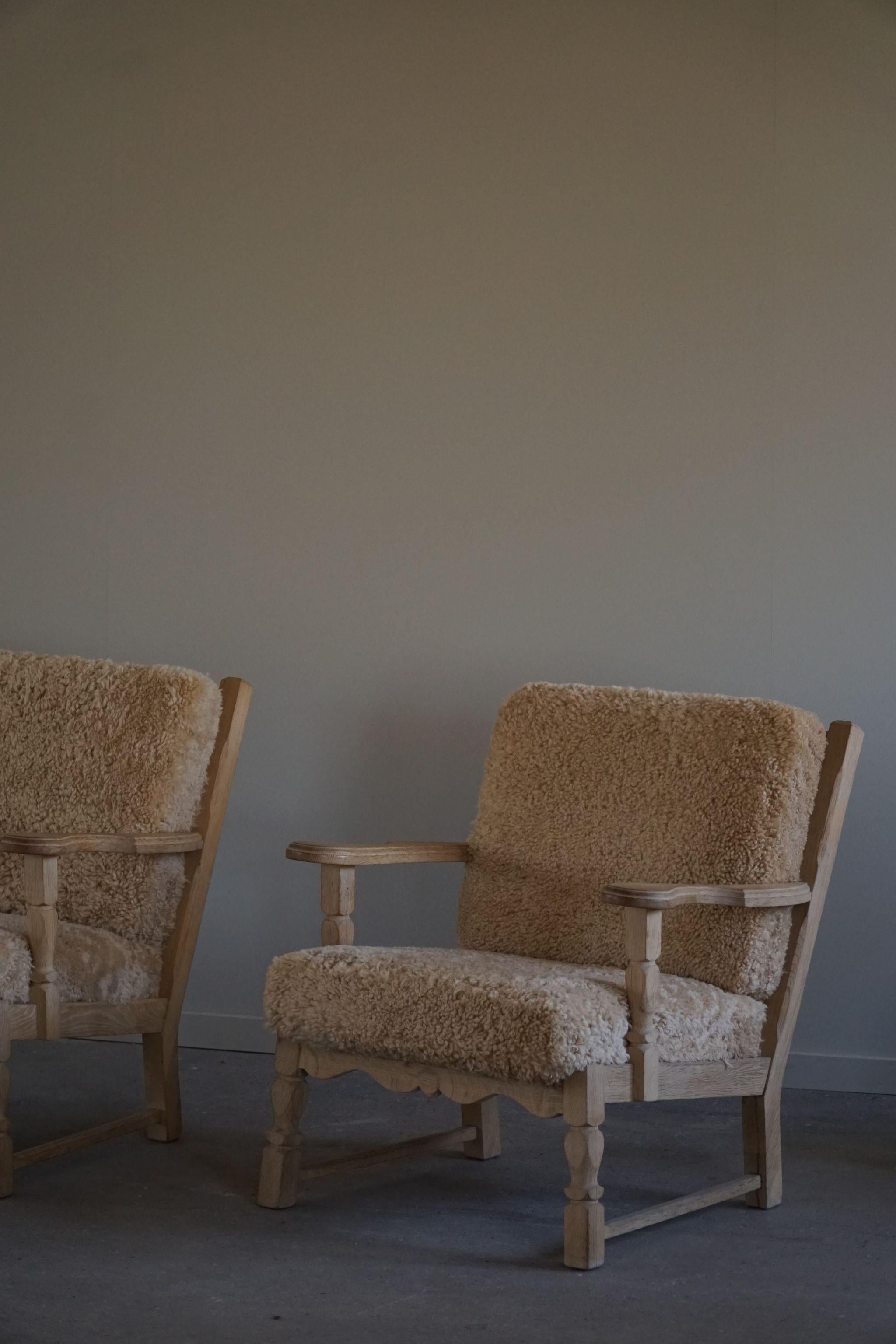 Pair of Danish Modern Lounge Chairs in Oak & Lambswool, Henning Kjærnulf, 1960s 5