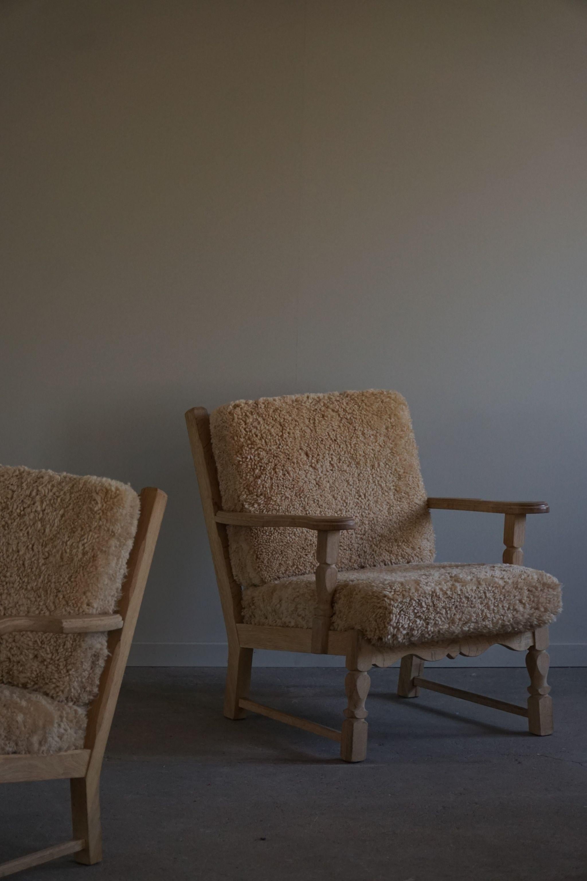 Pair of Danish Modern Lounge Chairs in Oak & Lambswool, Henning Kjærnulf, 1960s 14