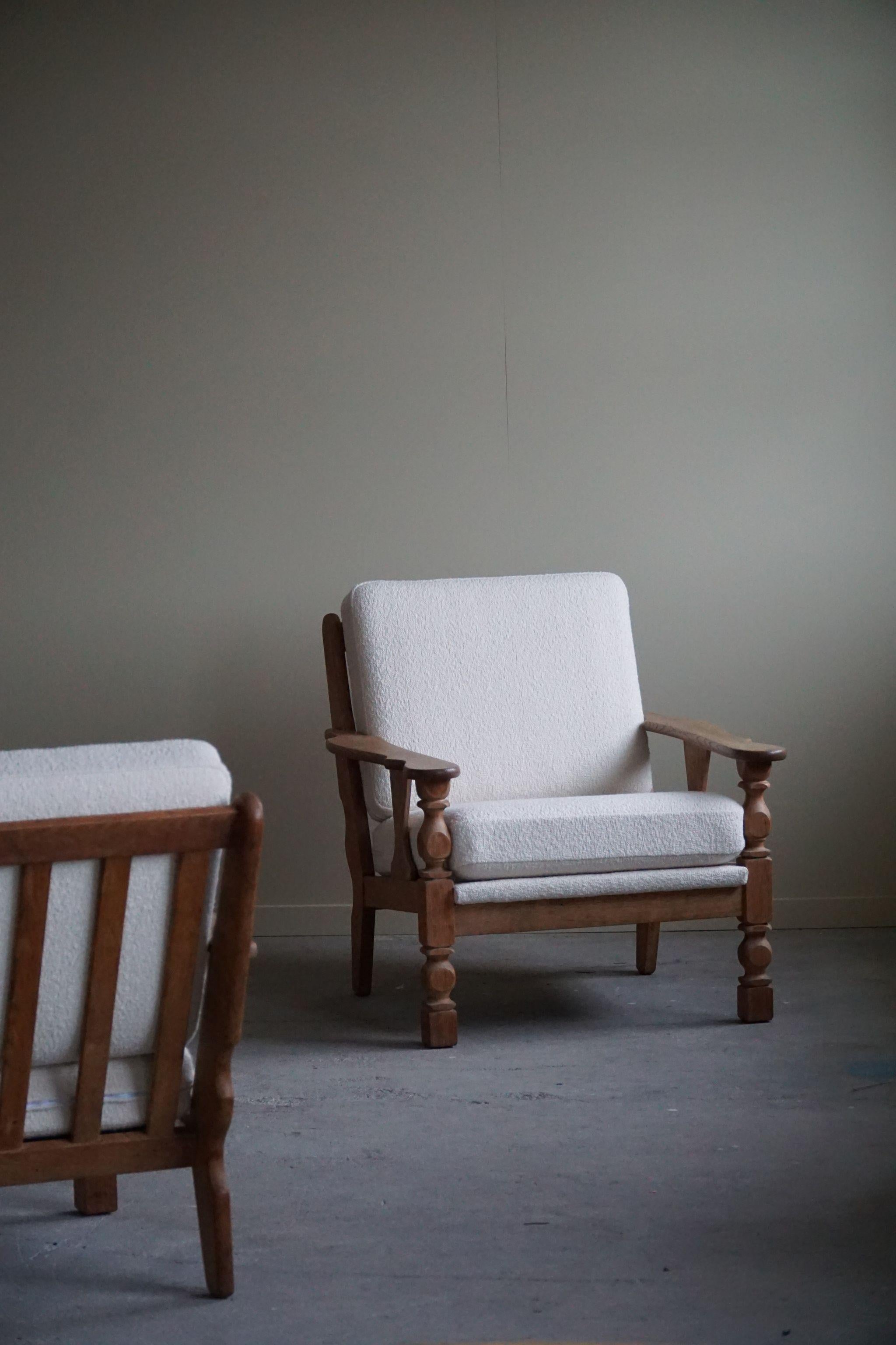 Pair of Danish Modern Lounge Chairs in Oak & Bouclé, Henning Kjærnulf, 1960s 3
