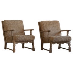 Pair of Danish Modern Lounge Chairs in Oak 
Lambswool, Henning Kjærnulf, 1960s