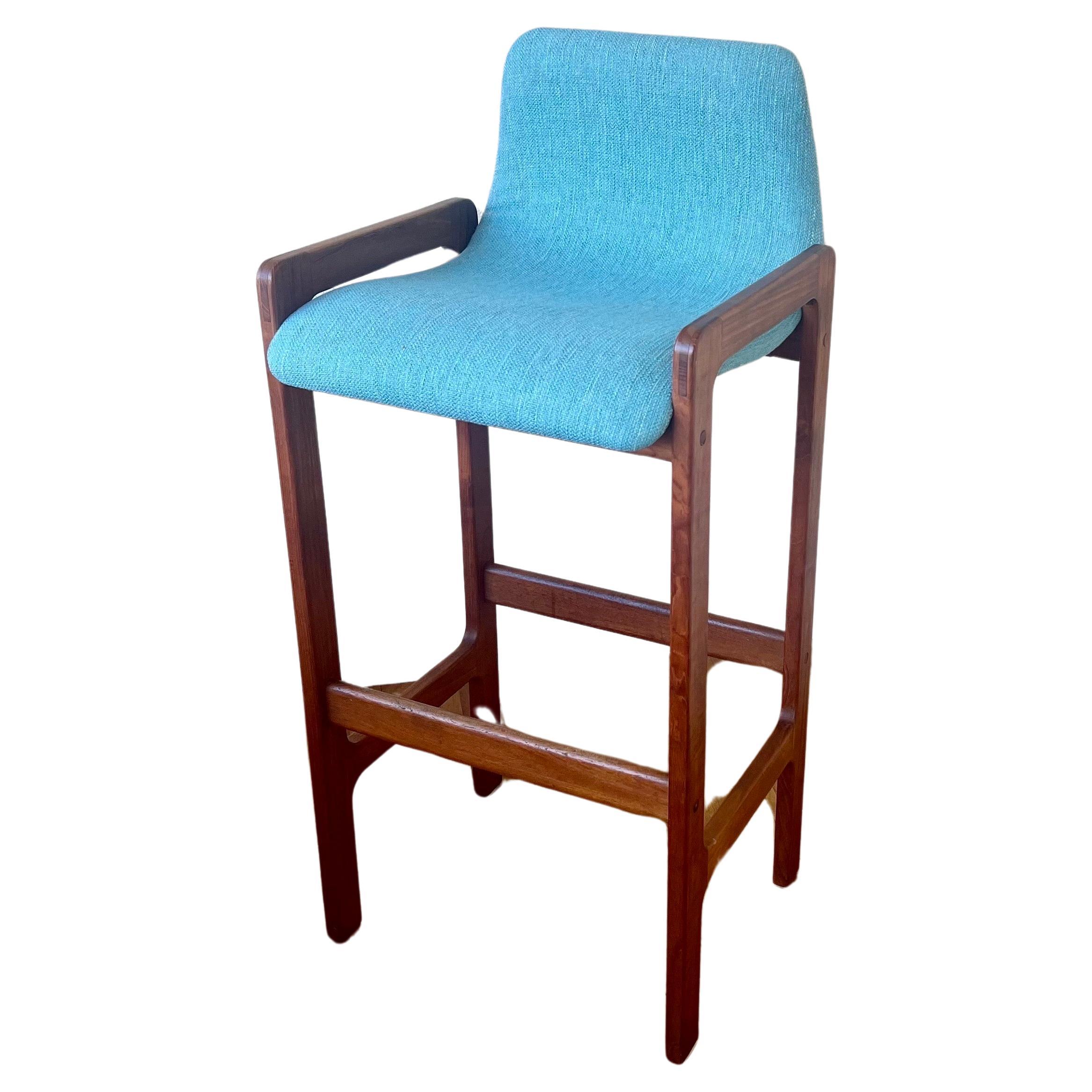 Great set of two barstools in excellent condition, new upholstery in Knoll aqua color upholstery great condition, nice foam solid, and sturdy frames. In solid teak with footrest. And comfy molded seats.