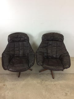 Pair of Danish Modern Swivel Lounge Chairs with Leather Upholstery