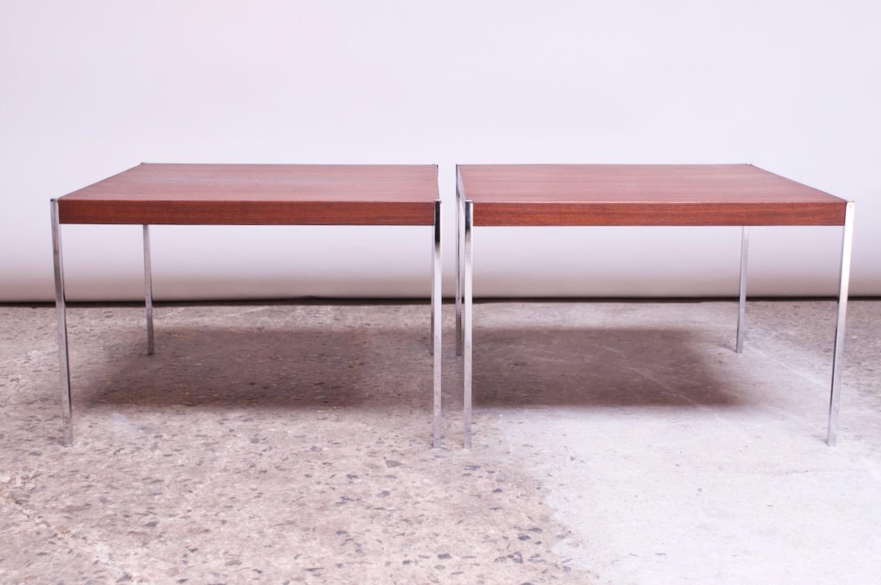 Pair of 1960s Danish teak side / end tables supported by chromed-steel legs. Minimal, yet elegant form.
Newly refinished, but a couple of surface scuffs remain. Chrome has been newly re-plated.
Measures: H 15.75