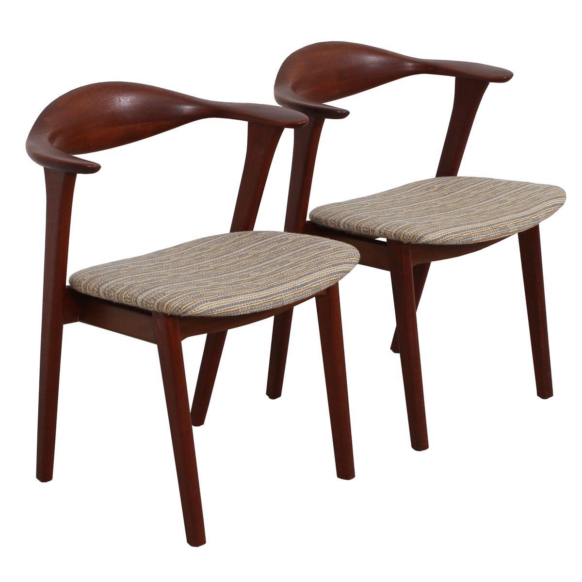 Pair of Danish Modern Teak Arm Chairs by Erik Kirkegaard

Additional information:
Material: Teak, Upholstery
Extraordinary pair of chairs designed by Danish Modern master of design, Erik Kirkegaard, known for chairs that are beautiful to look