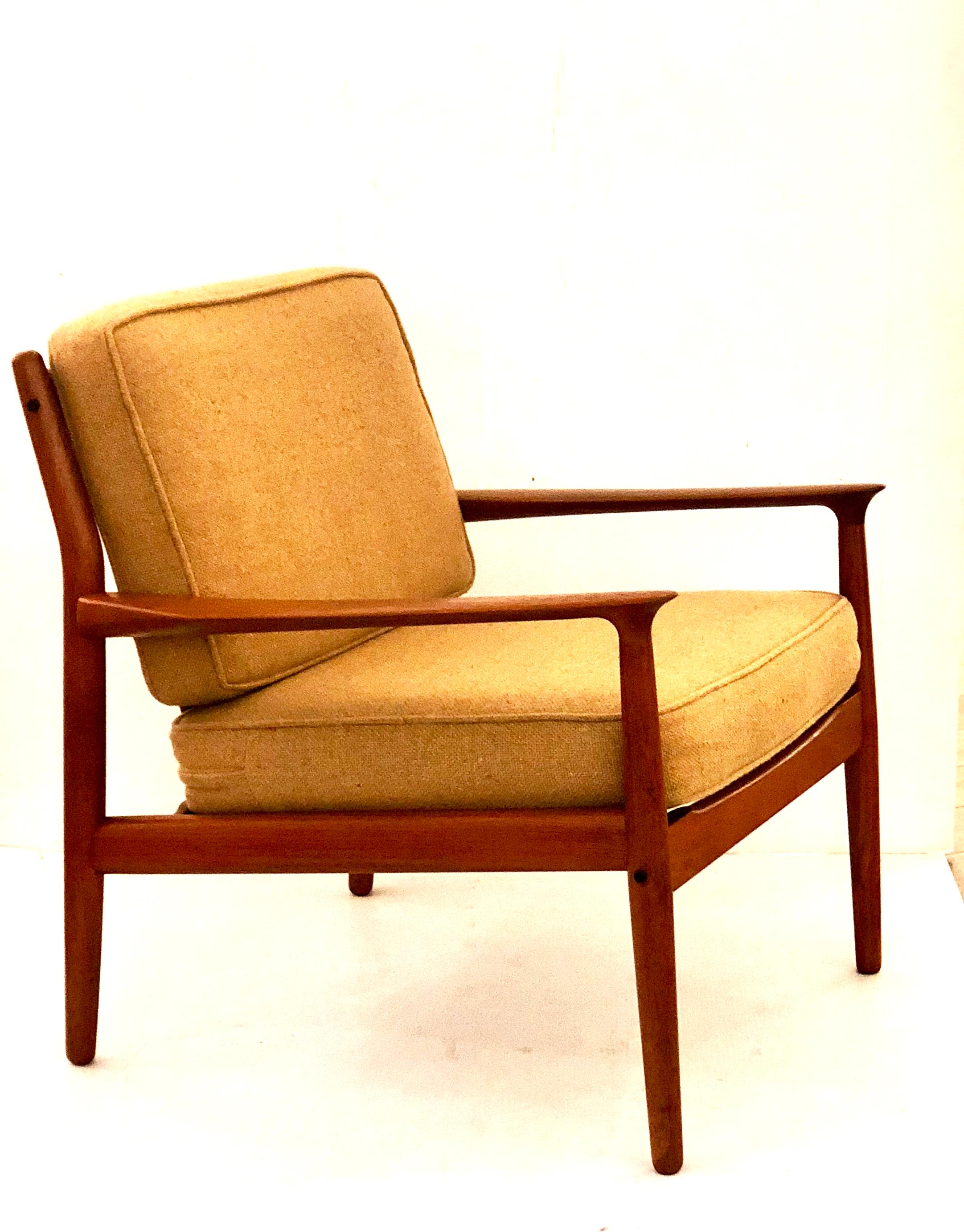 A great pair of Danish modern solid teak frames chairs designed by Greta Jalk for Glostrup Mobelfabrik, circa 1950s very nice and clean condition we have oil them and clean them , comes with its original cushions, nice clean condition, non-smokers