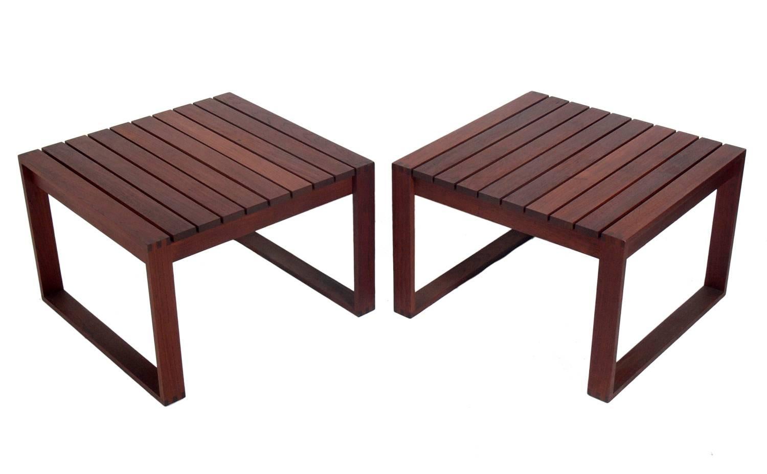 Pair of Danish modern teak slat end tables, Denmark, circa 1960s. They are a versatile size and can be used as end or side tables, or as nightstands.