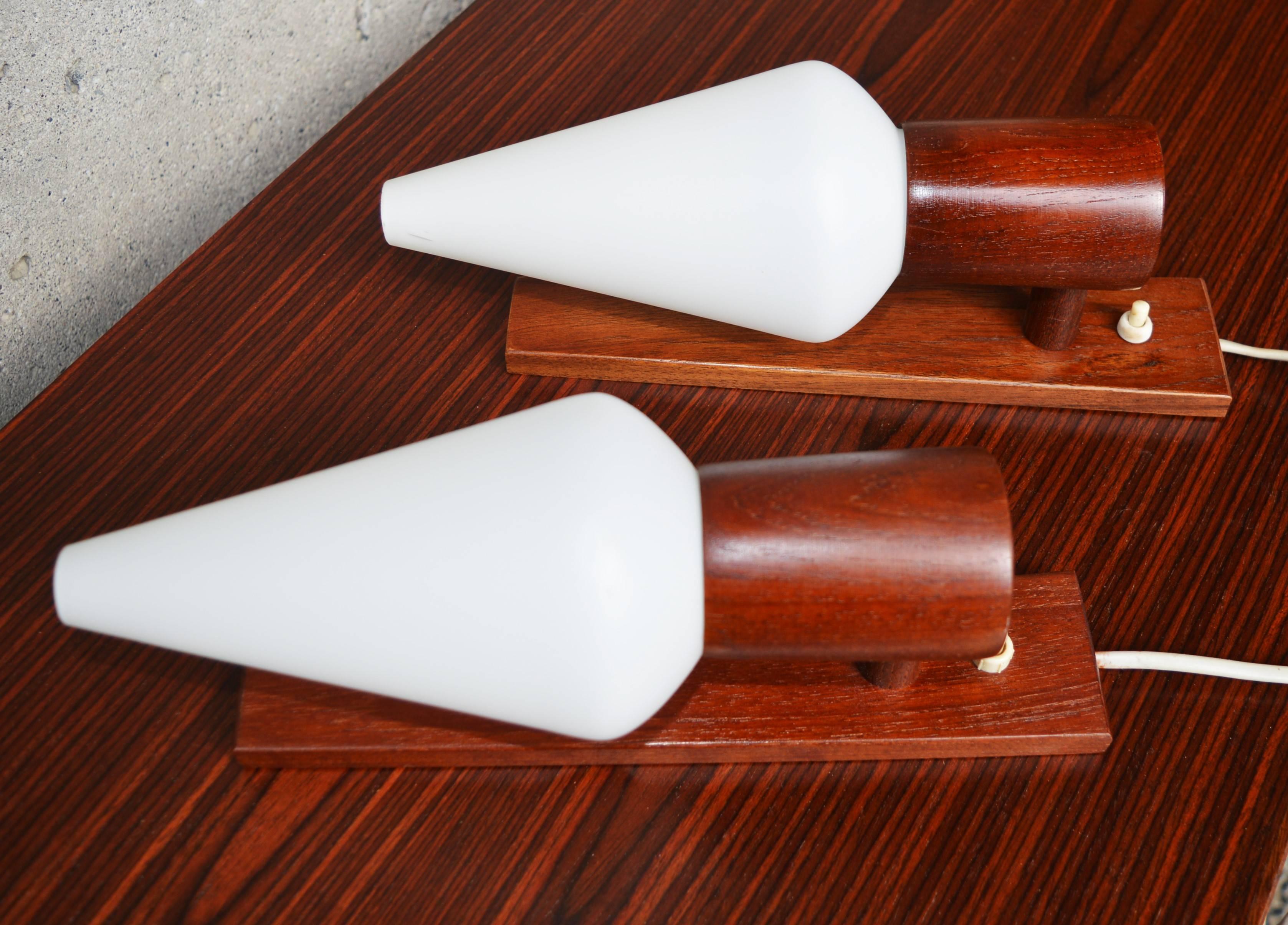 Scandinavian Pair of Danish Modern Teak Wall Sconces with Conical Frosted White Glass Shades