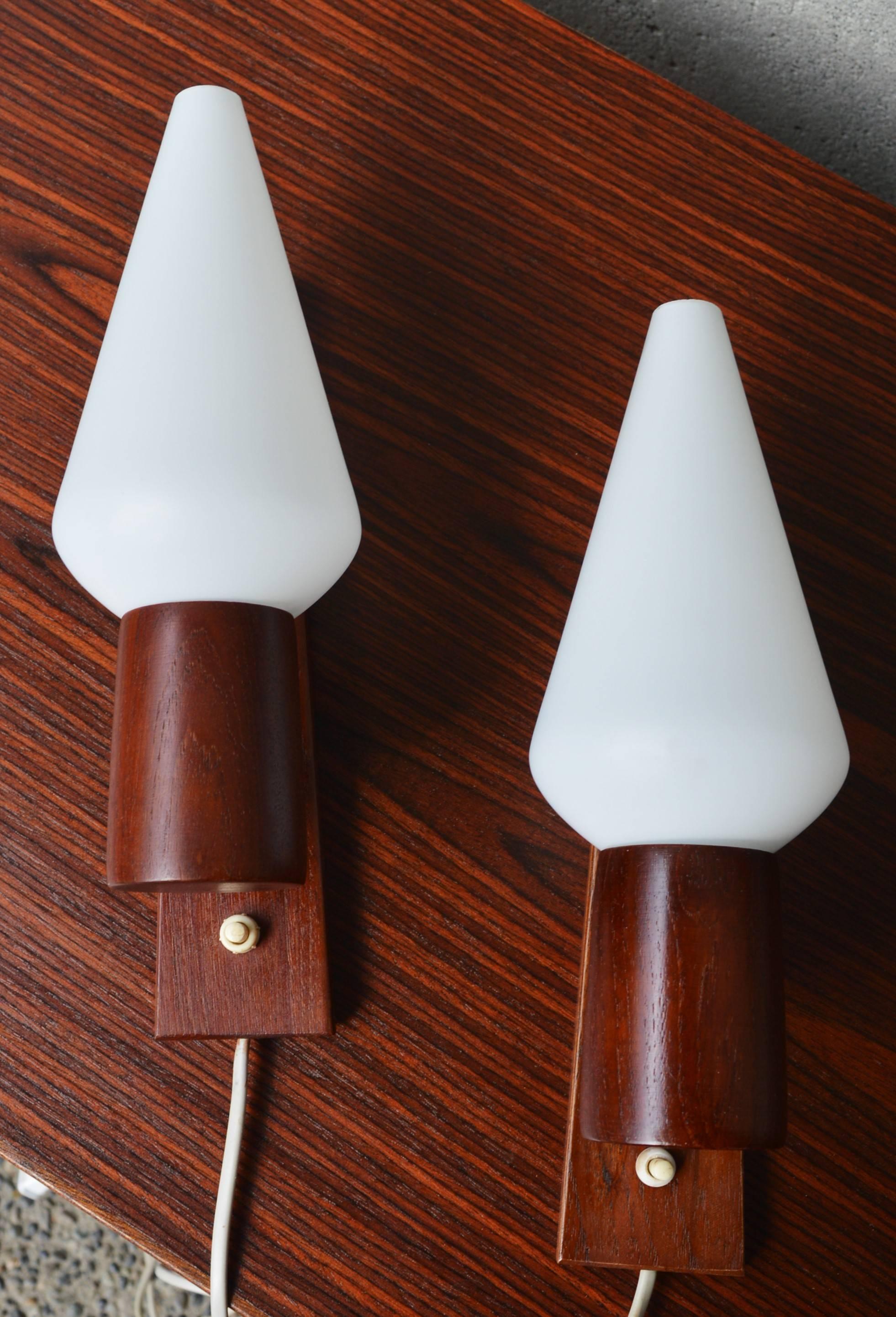 Art Glass Pair of Danish Modern Teak Wall Sconces with Conical Frosted White Glass Shades