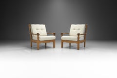 Pair of Danish Oak Easy Chairs with Carved Arm Supports, Denmark ca 1950s