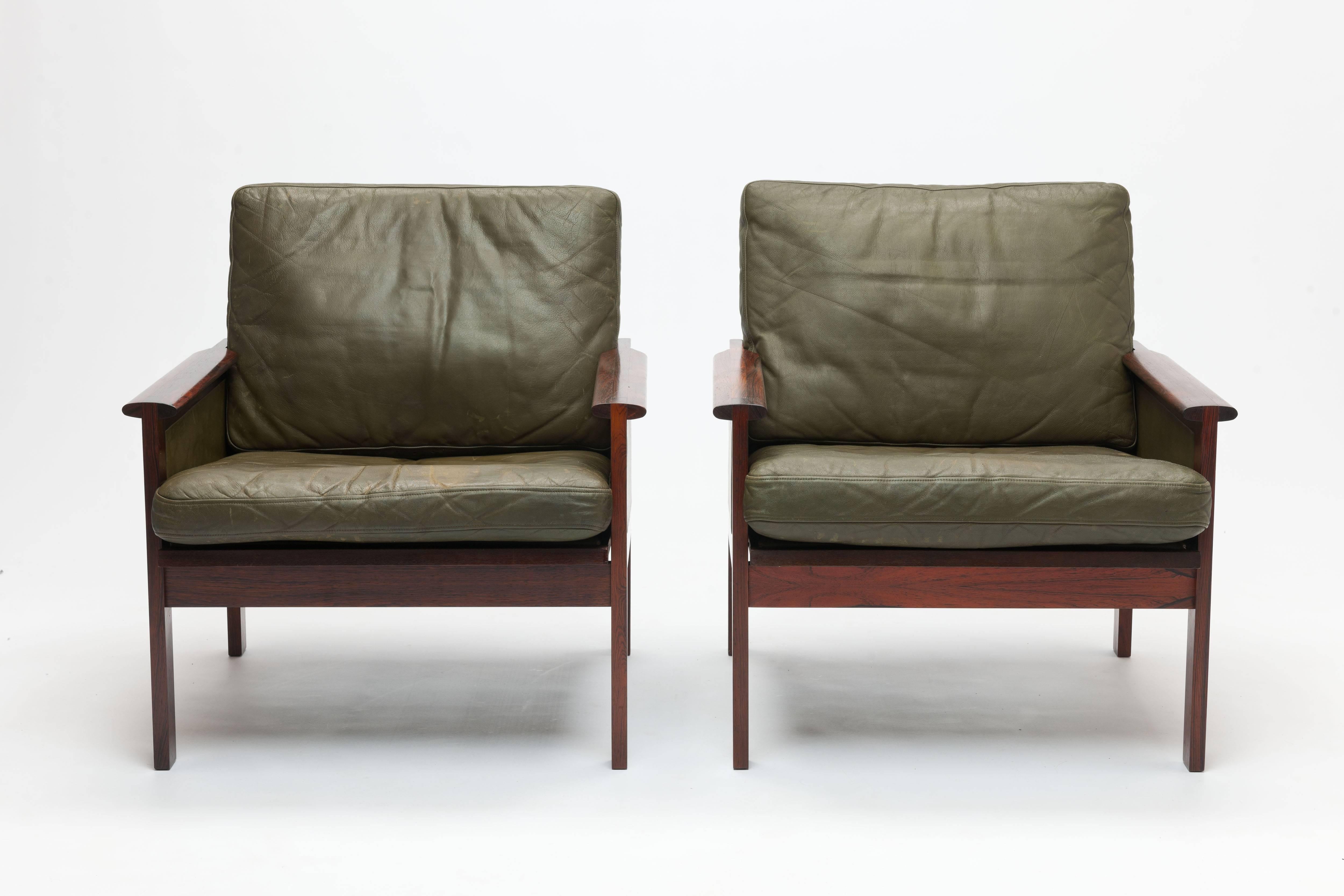Beautiful set of two all original rosewood and green leather armchairs by Illum Wikkelsø (Denmark, 1919-1999), designed in 1959 for N. Eilersen. Wikkelsø’s background in cabinetry engendered in him a profound understanding of materials and an