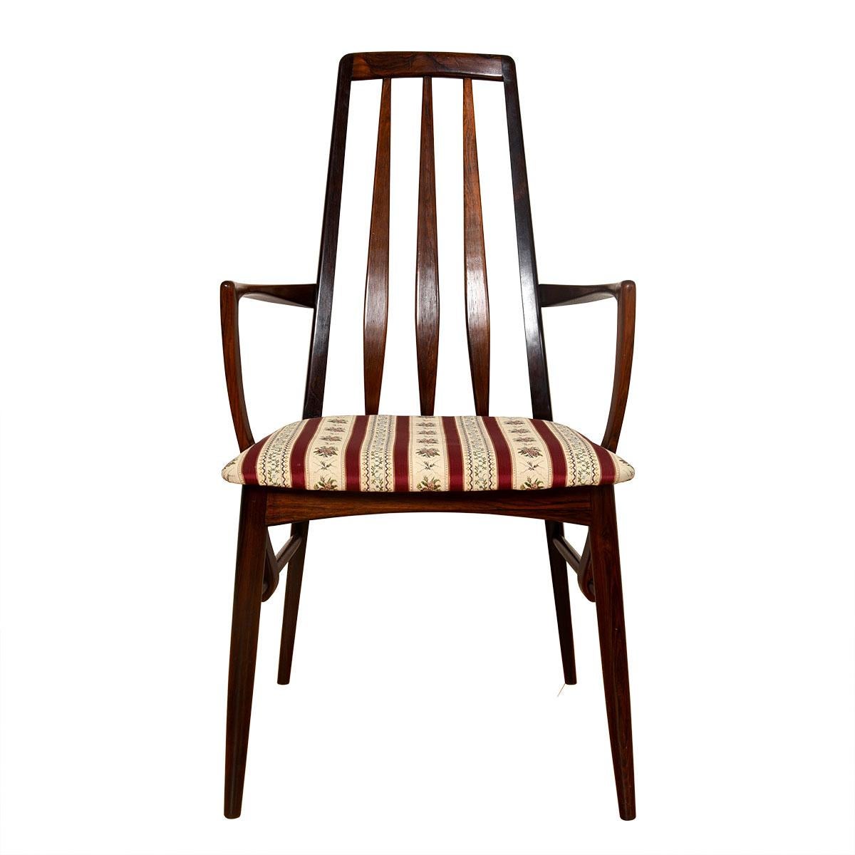 Pair of Danish Rosewood Arm Chairs by Koefoeds Hornslet

Additional information:
Material: Rosewood
Beautifully Proportioned and Refined Set of Rosewood Ladder Back Dining Chairs. Measurements are Approximate.
The Set Was in A Formal Dining