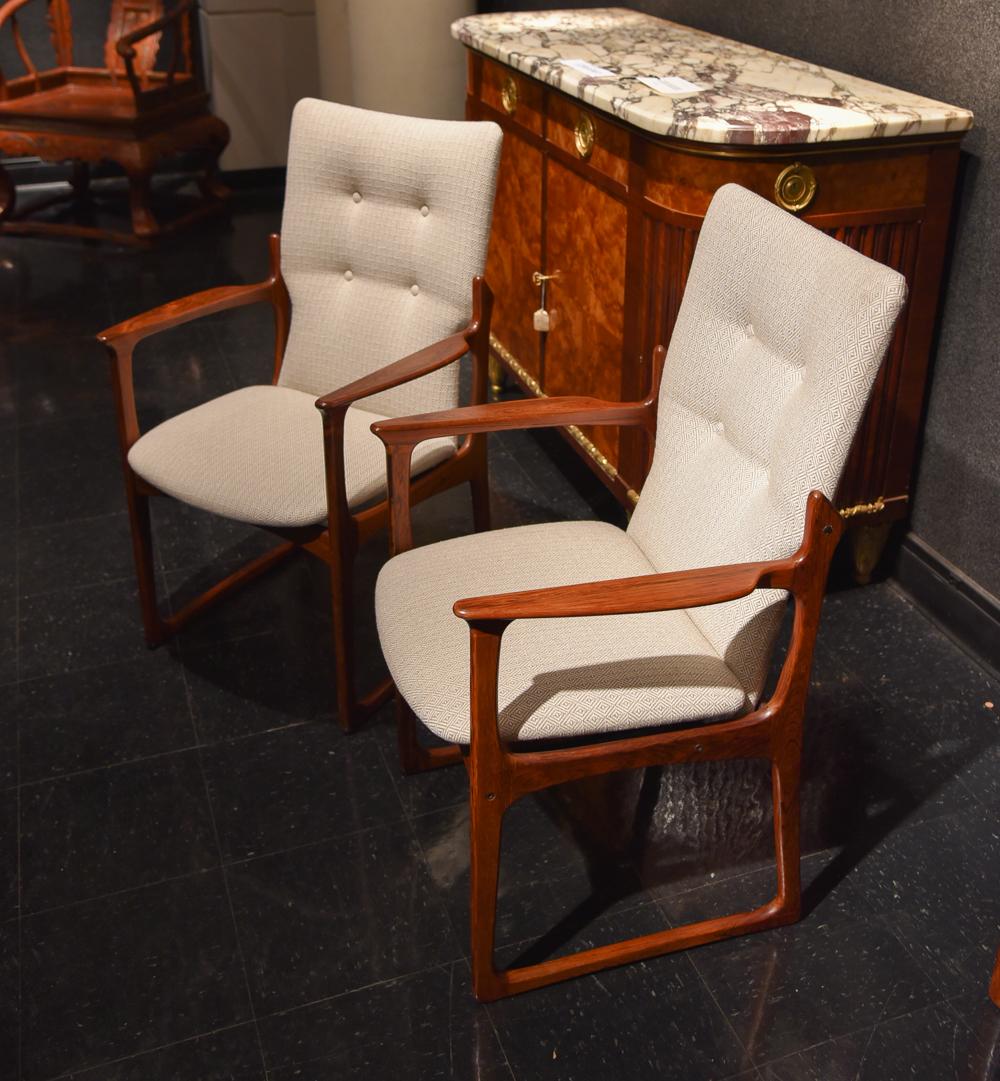 These chairs are now upholstered in a cream and brown fabric with small geometric design.

About Jacob Kjær, (1896-1957)
After receiving training in the workshop of his father, who was a furniture maker, Jacob Kjar went to places like Berlin and