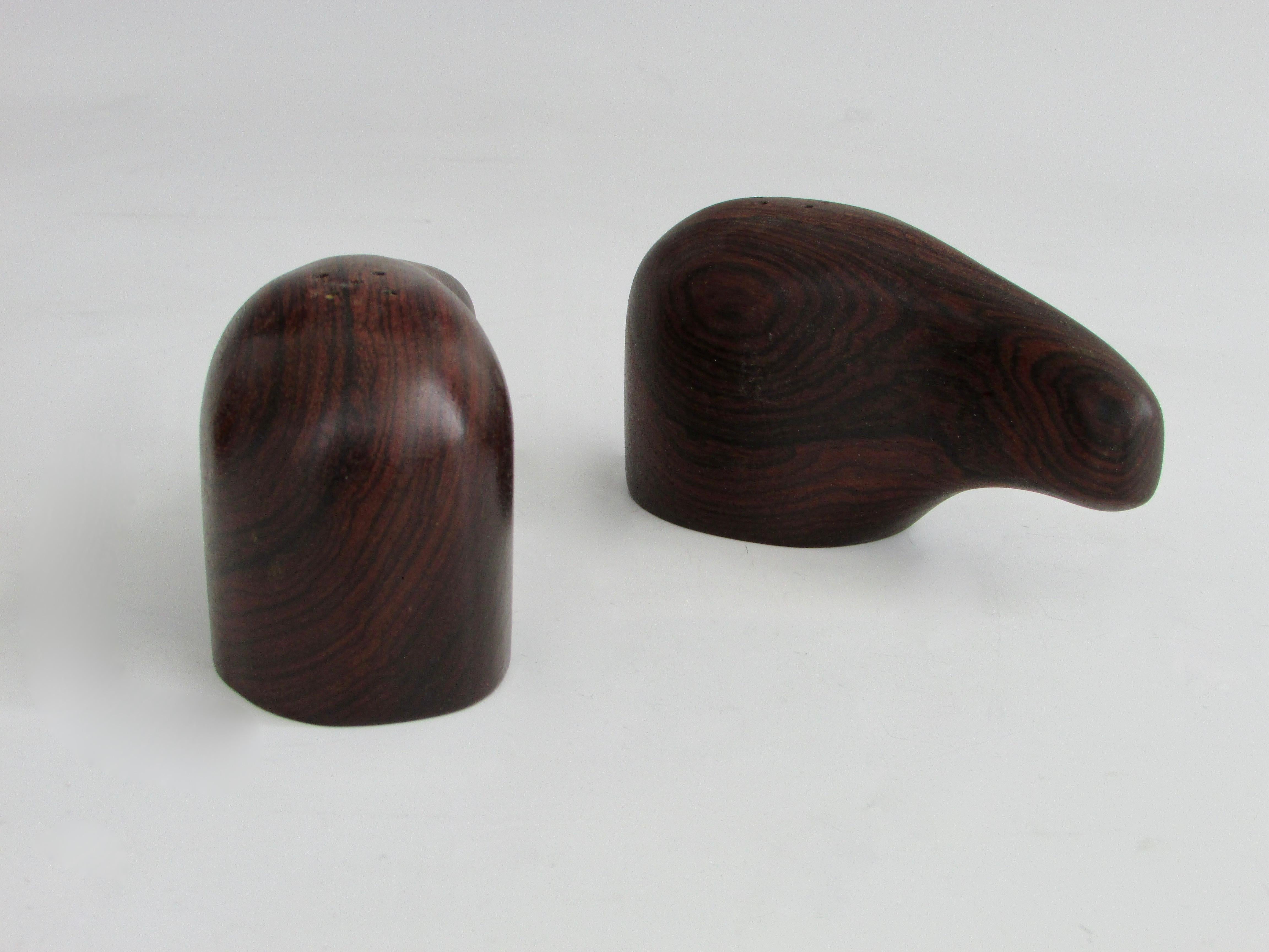 Two pairs available priced separately. Either set is rosewood. I believe them to be Danish origin.