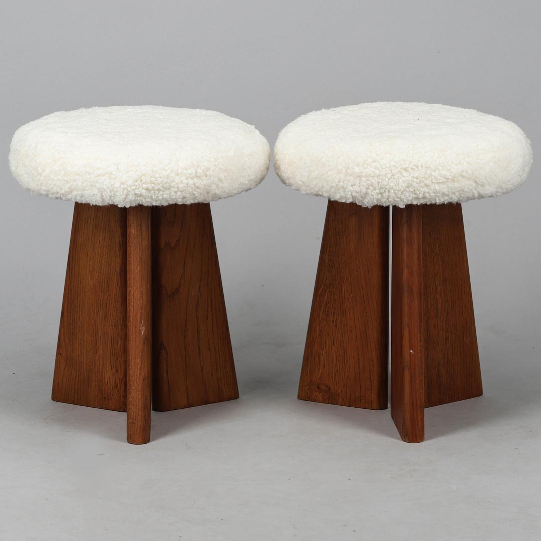 Pair of oak stools with sheepskin seat. Denmark Mid 20th Century. 