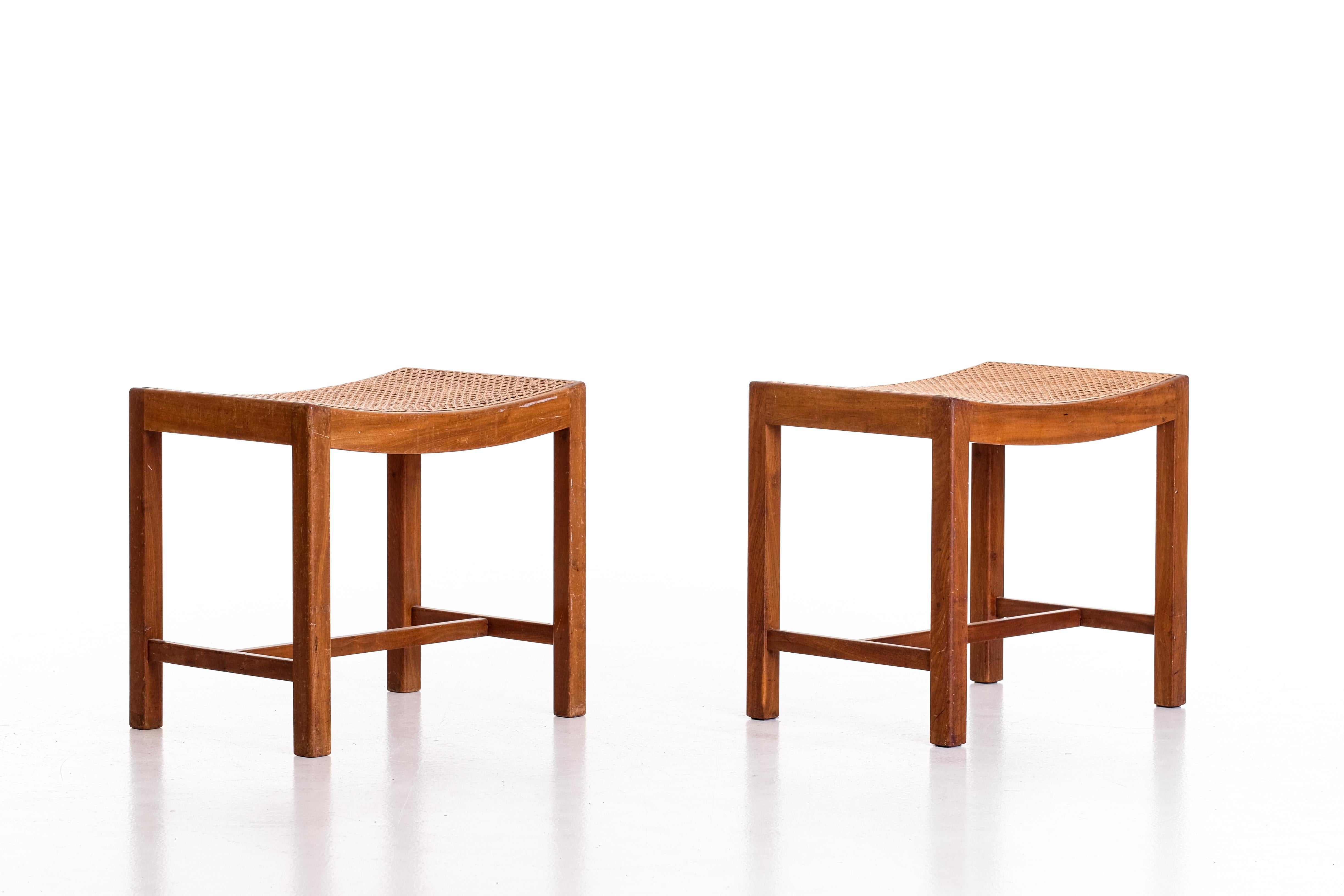Pair of stools in mahogny and cane, Denmark, 1940s.