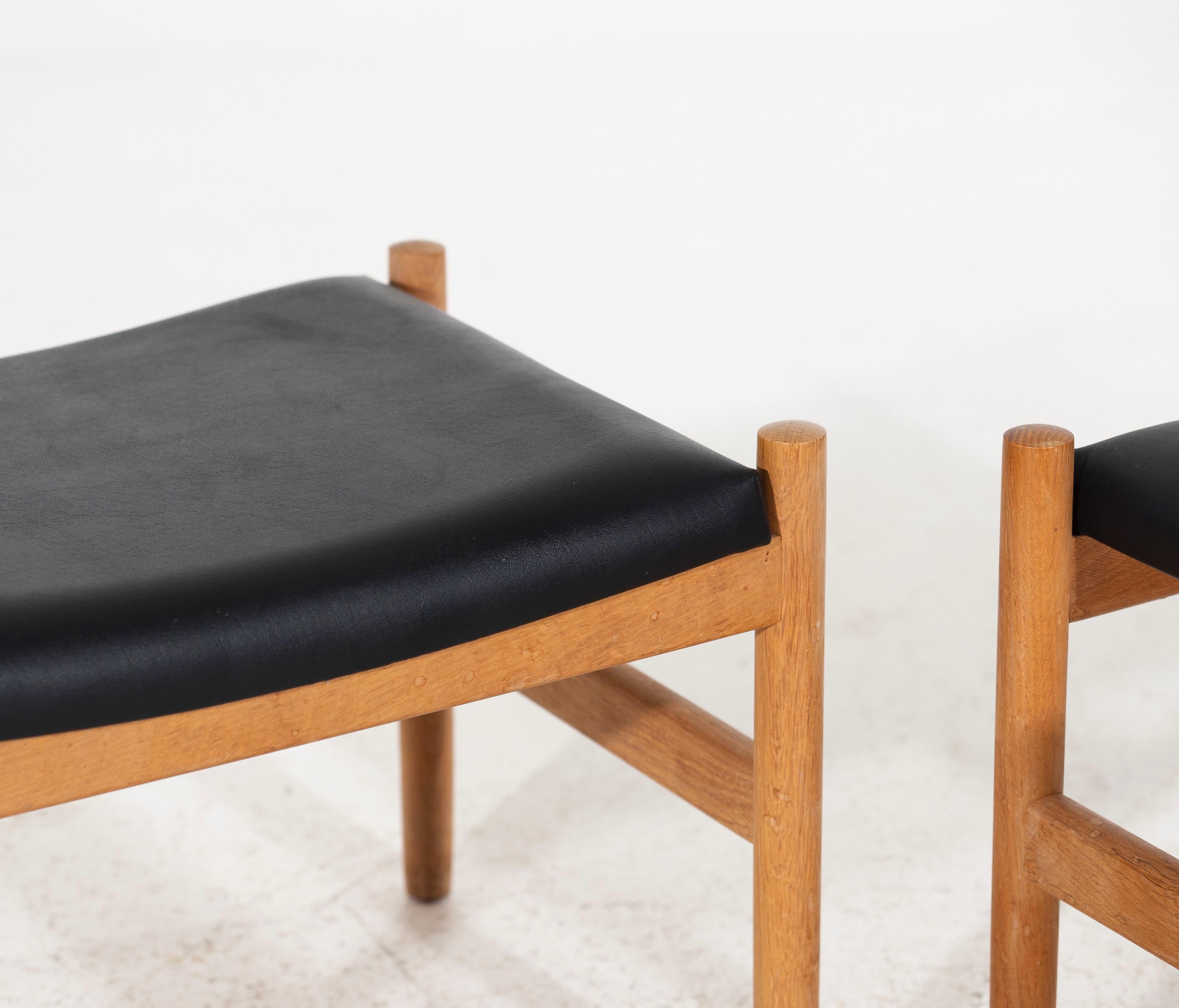 Leather Pair of Danish stools with leather seats, signed, 1960´s. For Sale