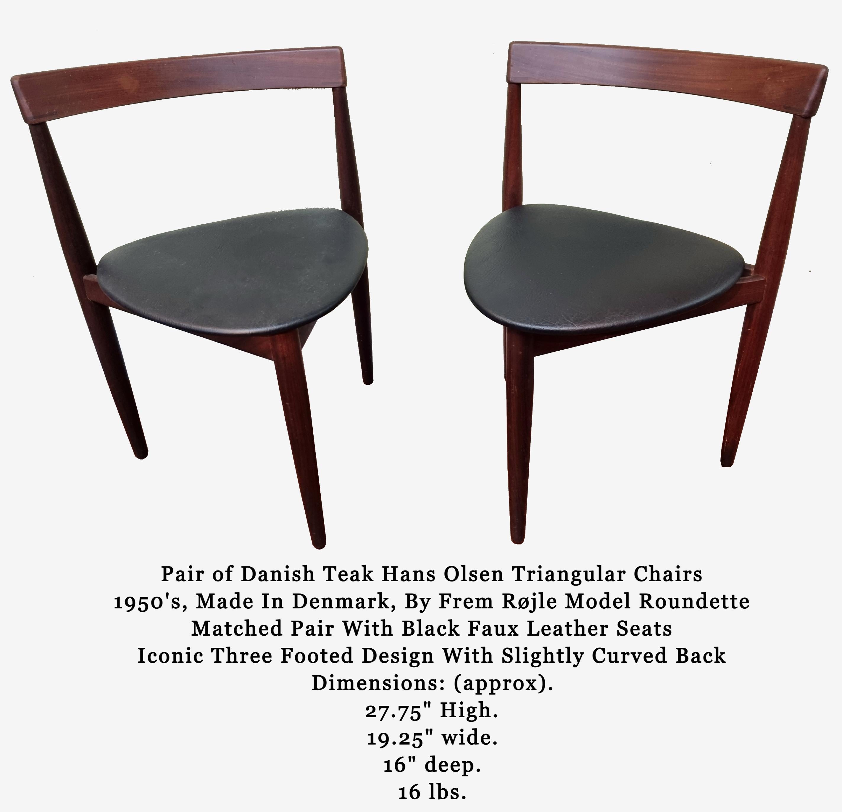 Pair of Danish Teak Hans Olsen Triangular Chairs 1950's, Made In Denmark, By Frem Røjle Model Roundette.
Matched Pair With Black Faux Leather Seats
Iconic Three Footed Design With Slightly Curved Back.

Dimensions: (approx).
27.75