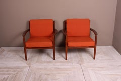 Pair of Danish Teak Lounge Chairs by Grete Jalk for France & Son